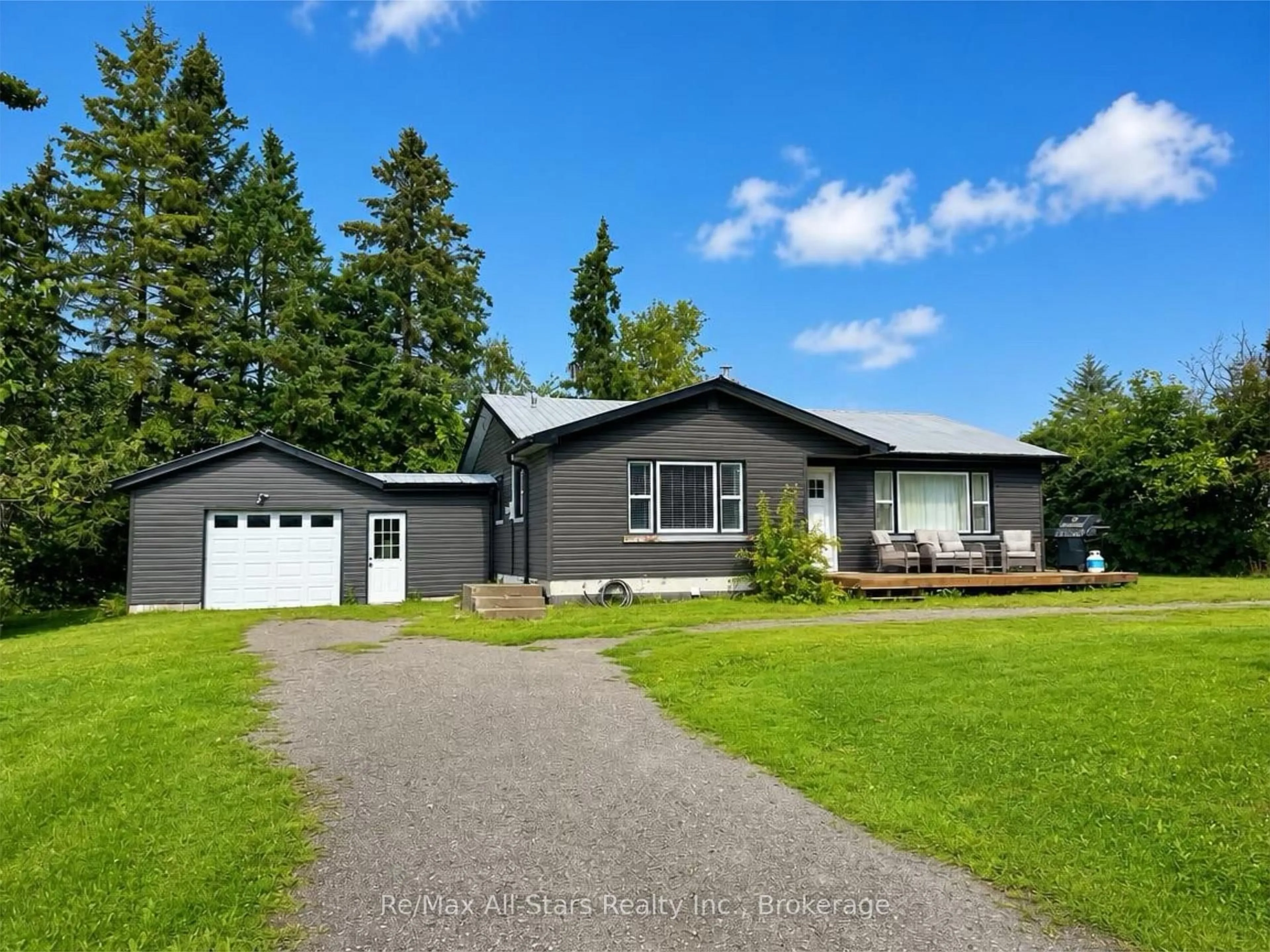 Home with vinyl exterior material, street for 815 County Road 8 Rd, Kawartha Lakes Ontario K0M 1N0