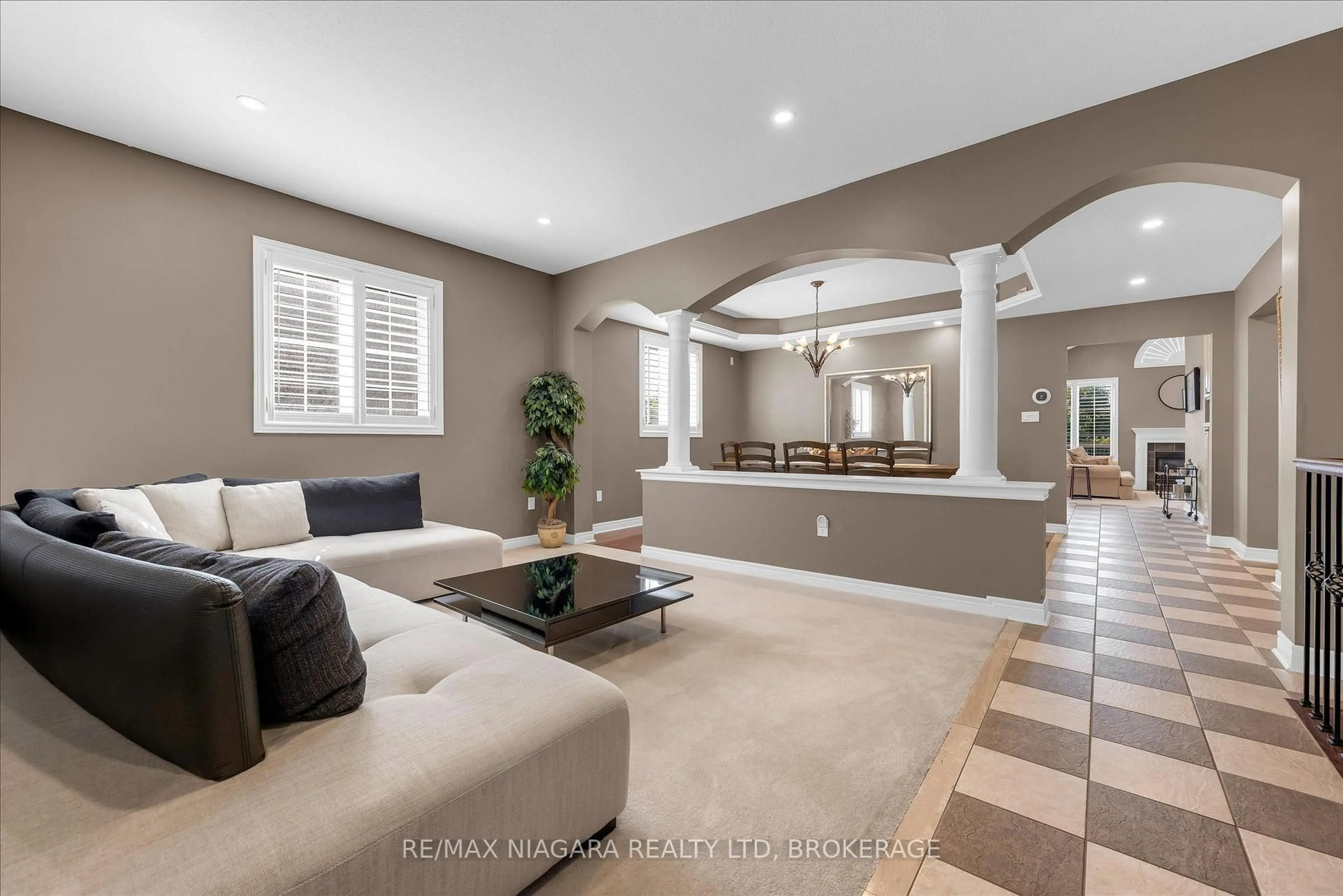 Living room with furniture, ceramic/tile floor for 404 Wright Cres, Niagara-on-the-Lake Ontario L0S 1J0