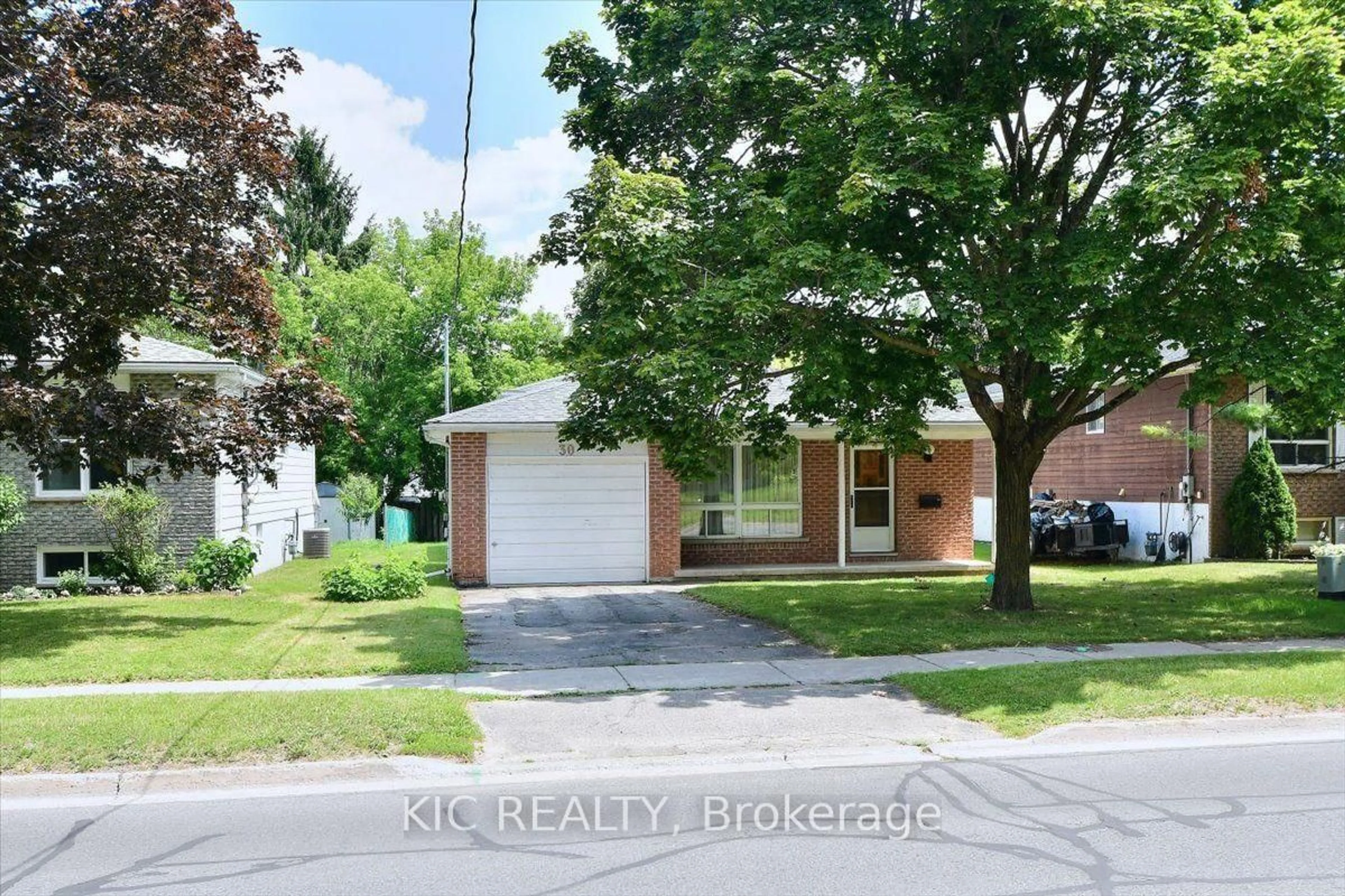 Home with brick exterior material, street for 30 Kawartha Heights Blvd, Peterborough Ontario K9J 8B3