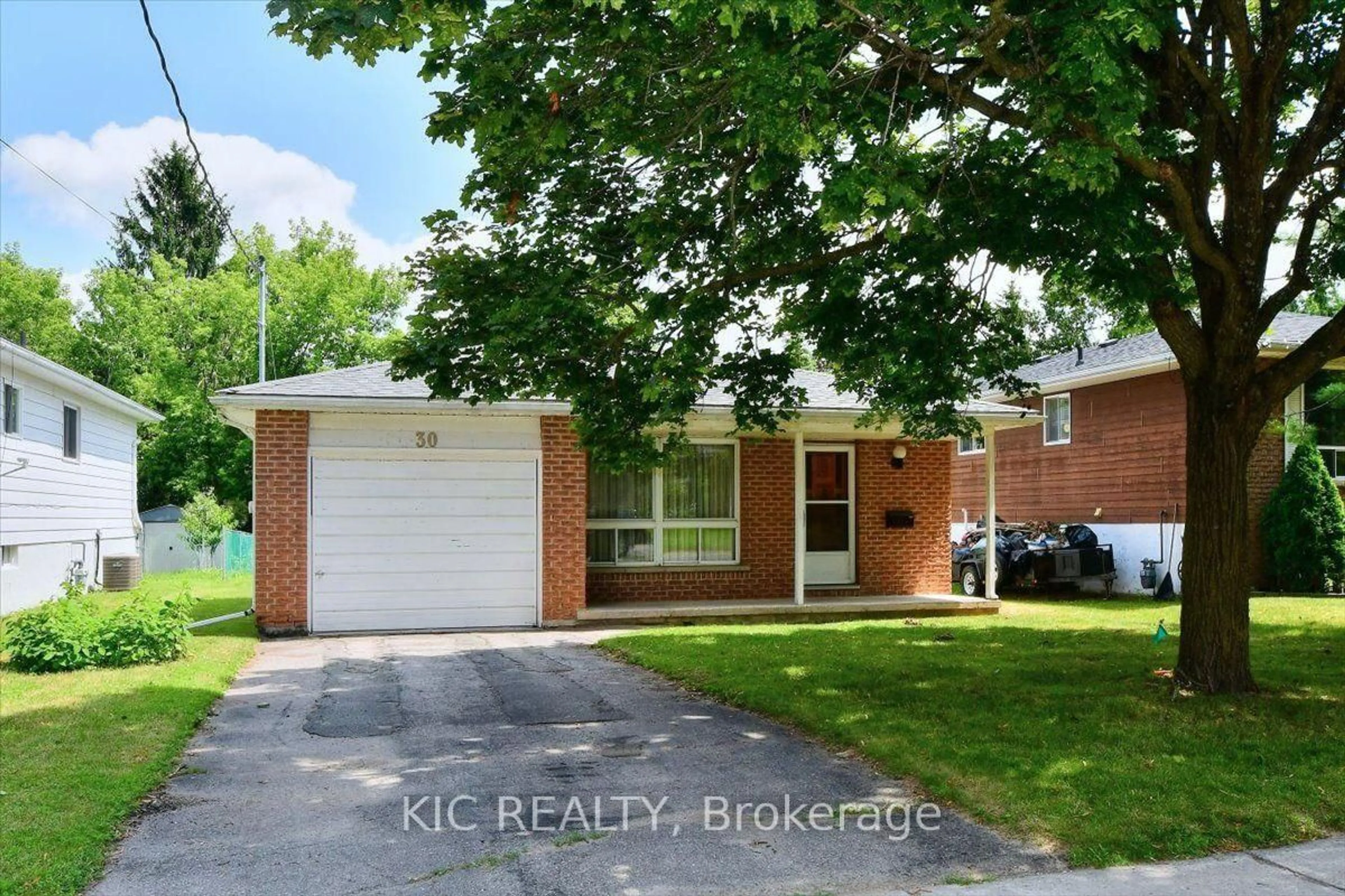 Home with brick exterior material, street for 30 Kawartha Heights Blvd, Peterborough Ontario K9J 8B3