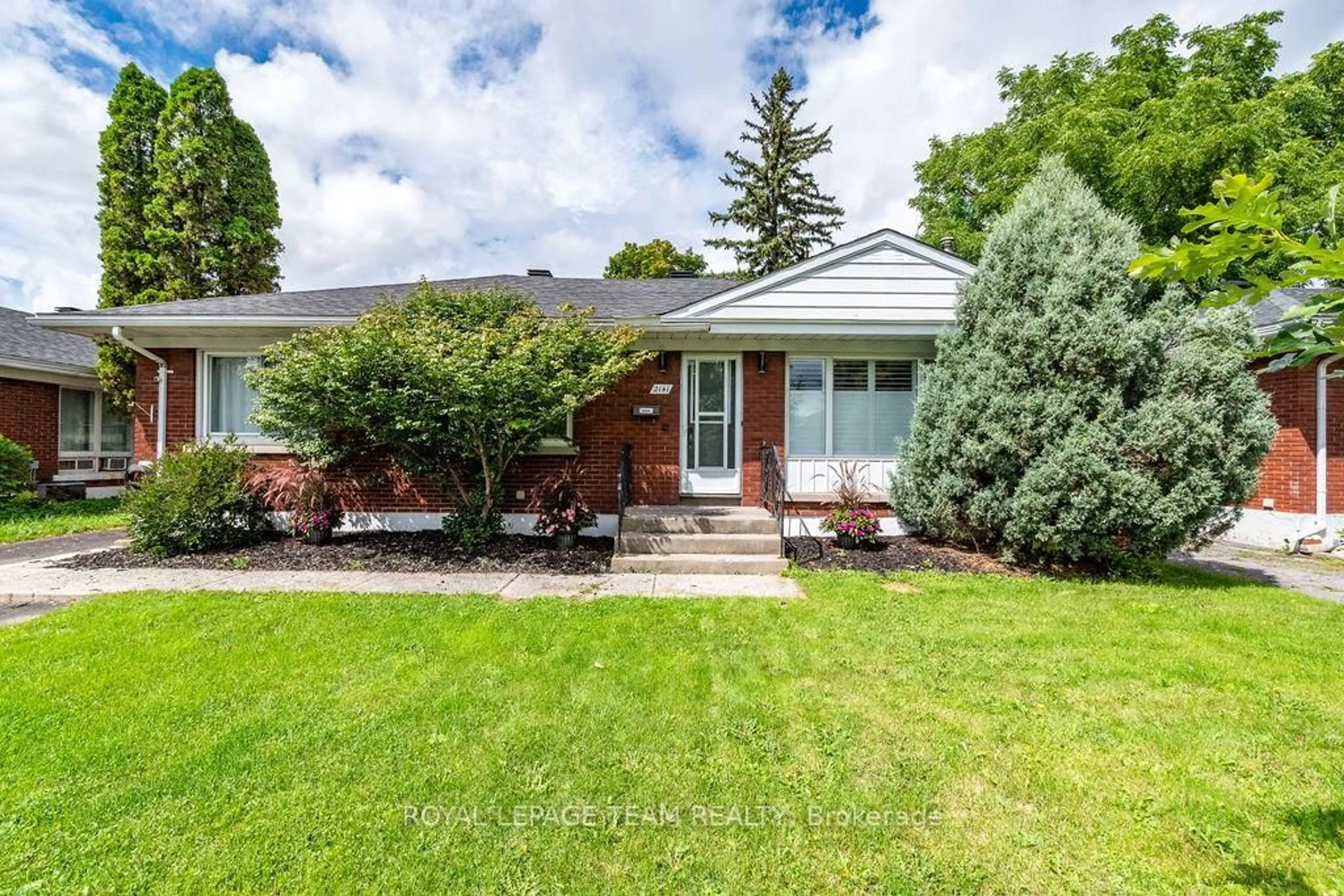 Home with brick exterior material, street for 2141 Belair Dr, Ottawa Ontario K2C 0X2