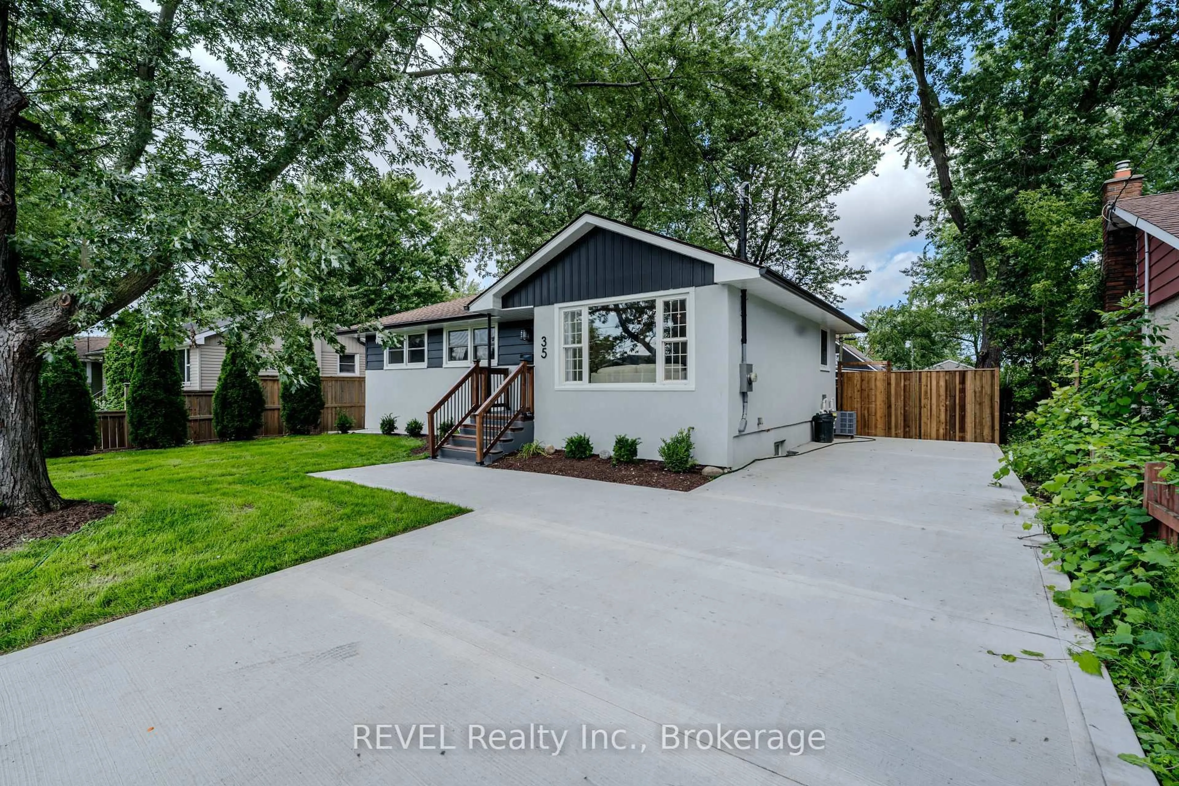 Home with vinyl exterior material, street for 35 Burness Dr, St. Catharines Ontario L2P 1J4