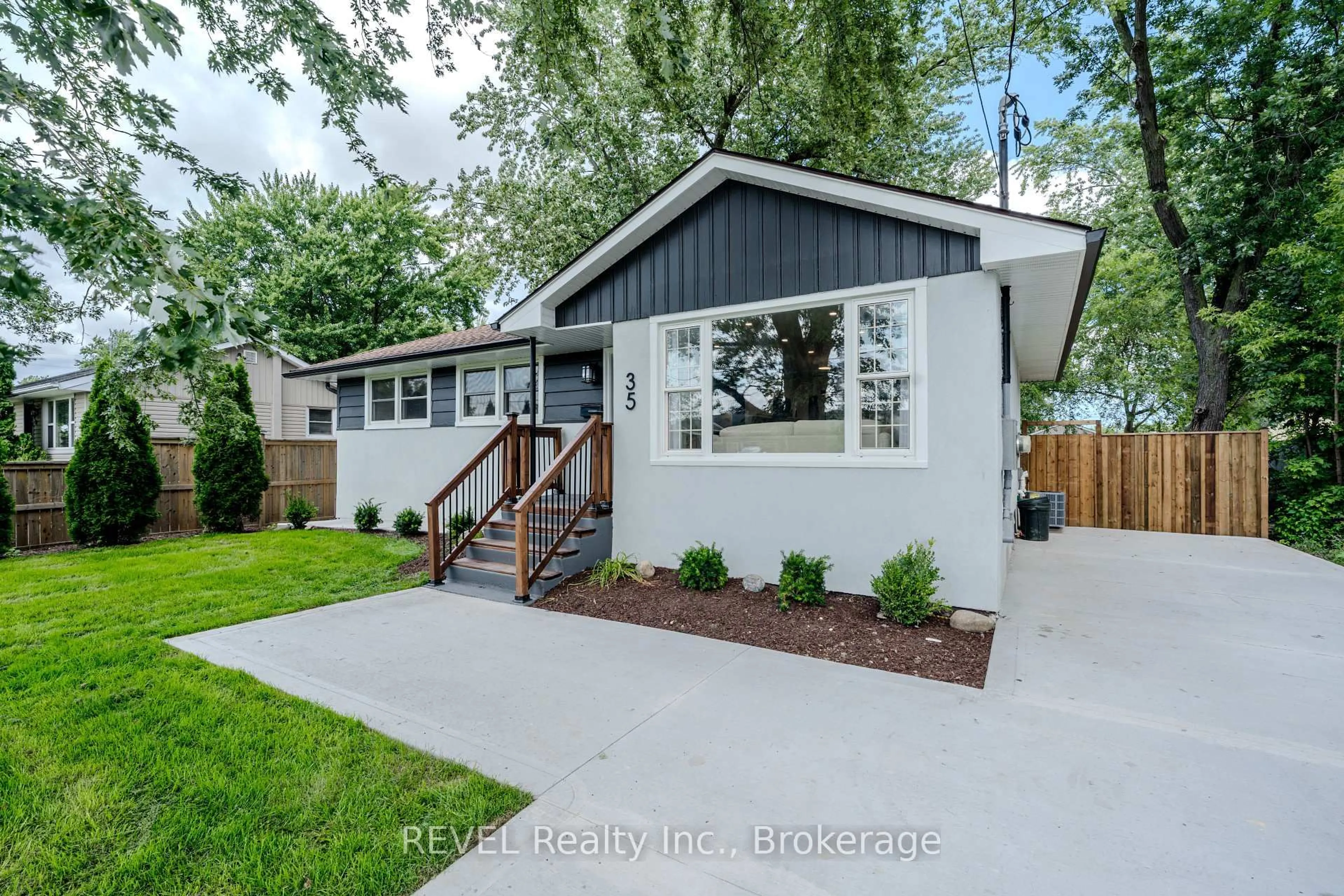 Home with vinyl exterior material, street for 35 Burness Dr, St. Catharines Ontario L2P 1J4
