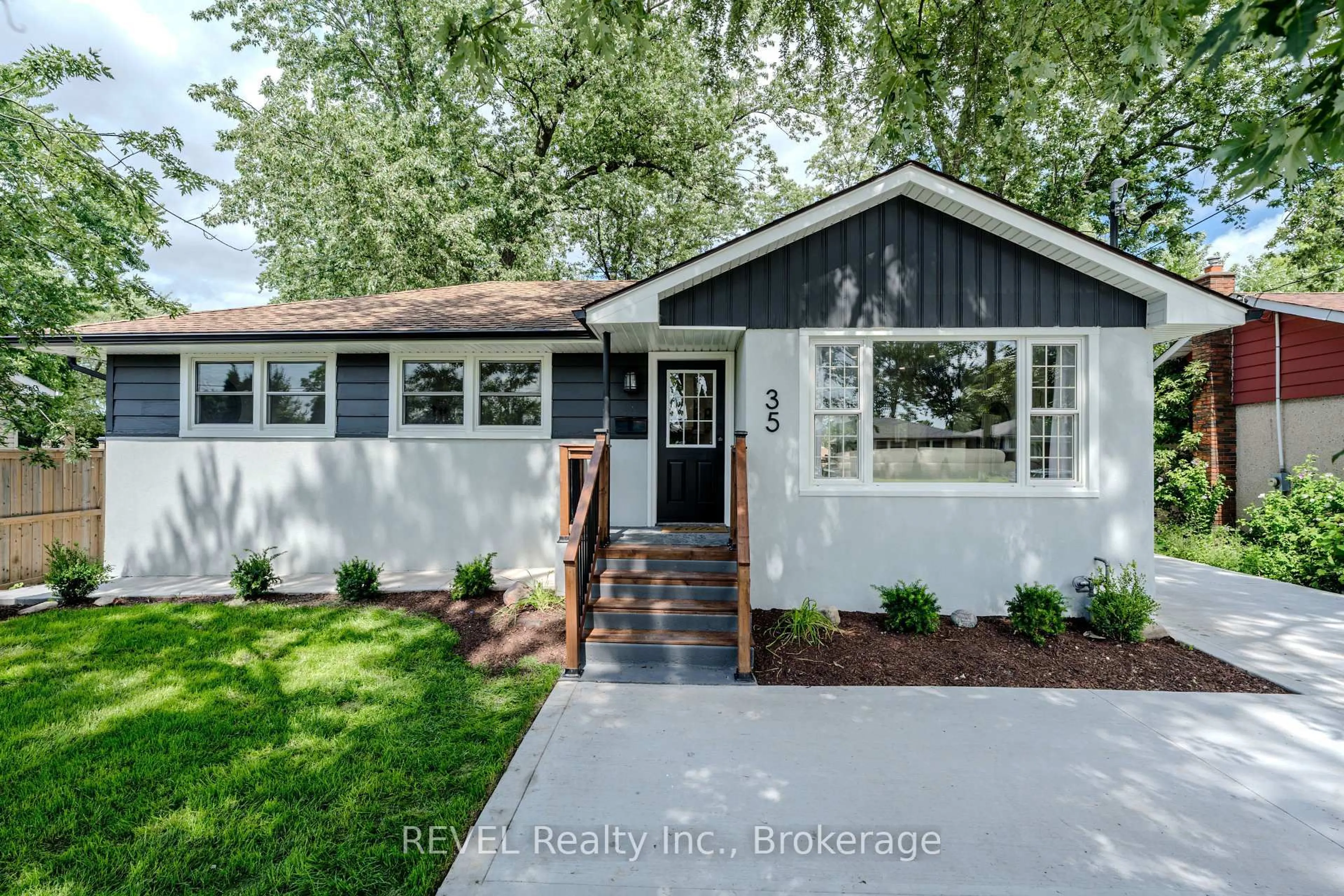 Home with brick exterior material, street for 35 Burness Dr, St. Catharines Ontario L2P 1J4