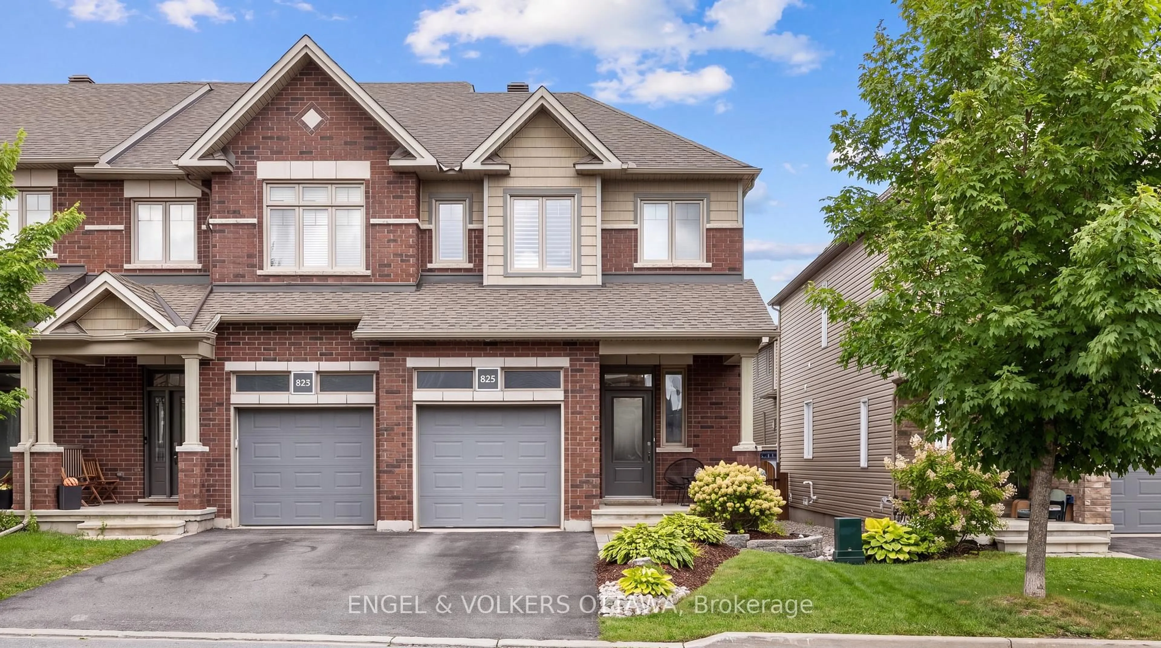 Home with brick exterior material, street for 825 Loosestrife Way, Ottawa Ontario K1T 0L8