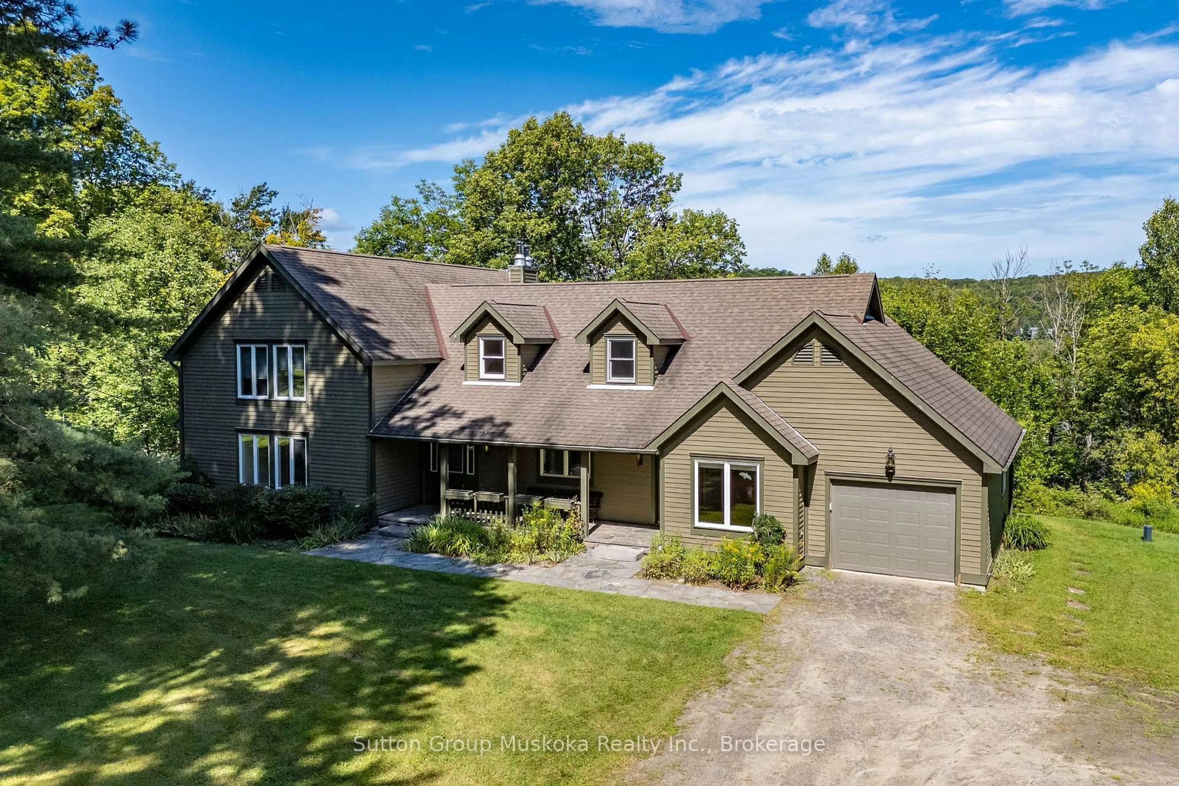A pic from outside/outdoor area/front of a property/back of a property/a pic from drone, unknown for 577 Canal Rd, Huntsville Ontario P1H 2J6