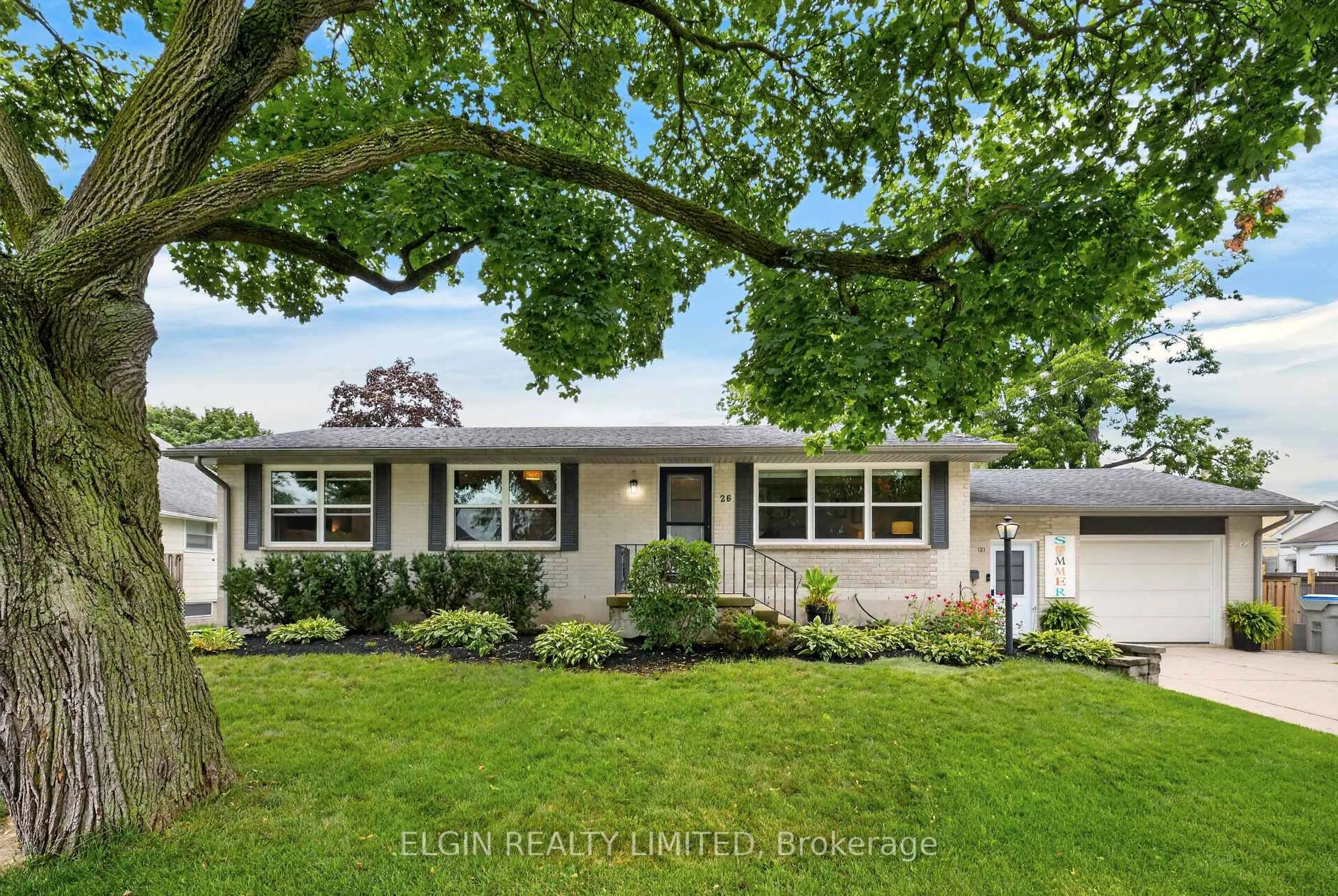 Home with vinyl exterior material, street for 26 Queen St, Strathroy-Caradoc Ontario N7G 2H7