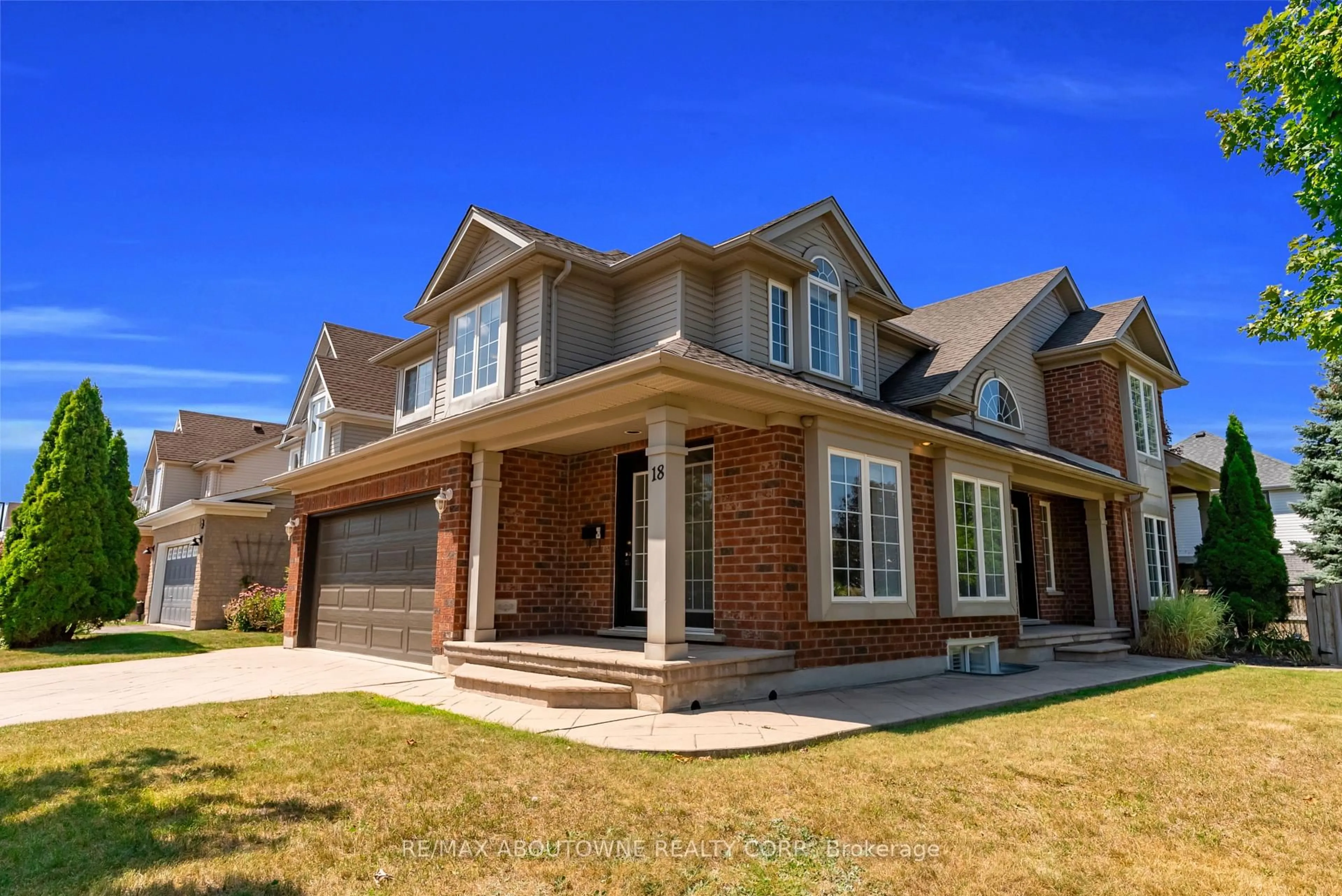 Home with brick exterior material, street for 18 Haney Dr, Guelph Ontario N1L 1N7