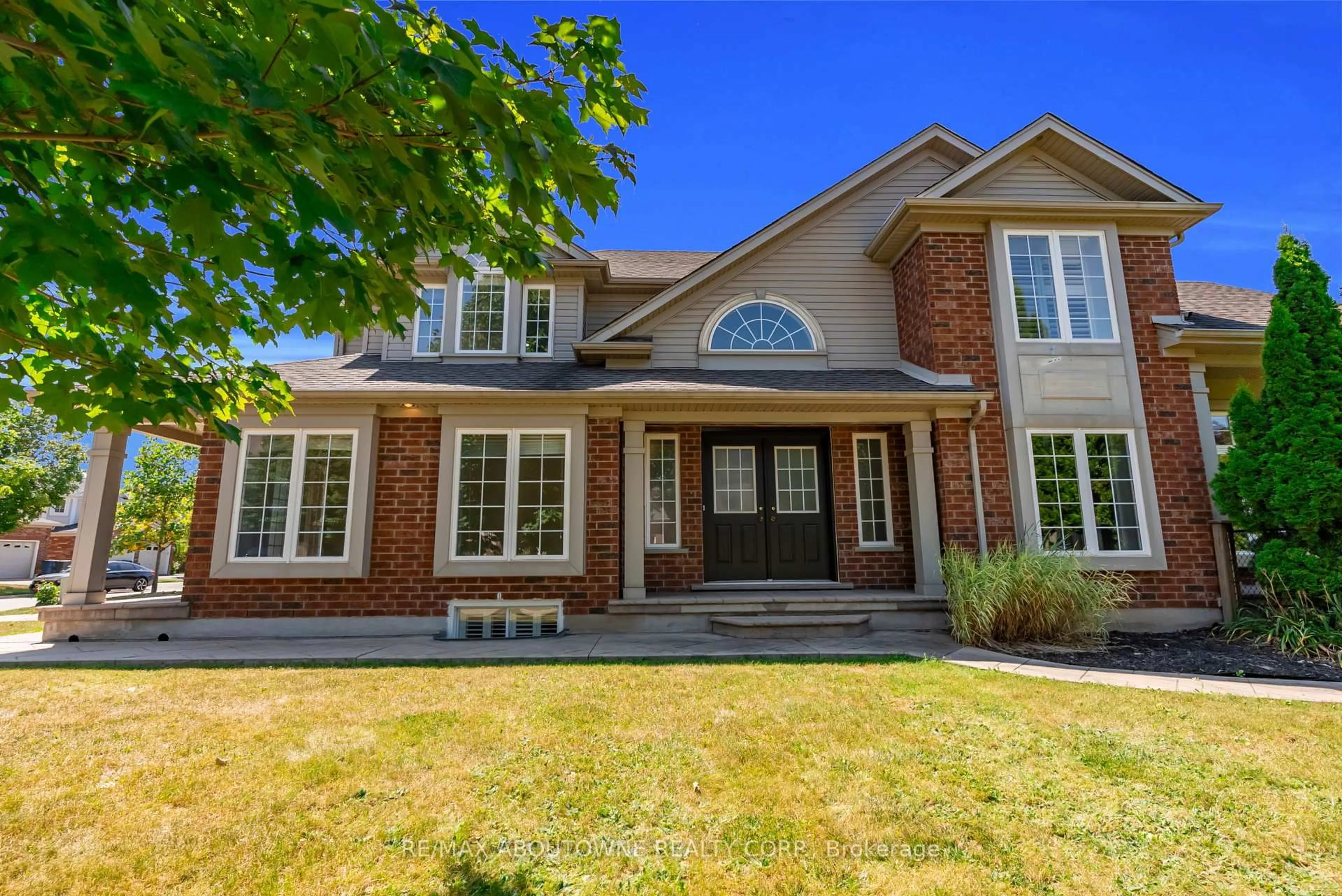 Home with brick exterior material, street for 18 Haney Dr, Guelph Ontario N1L 1N7