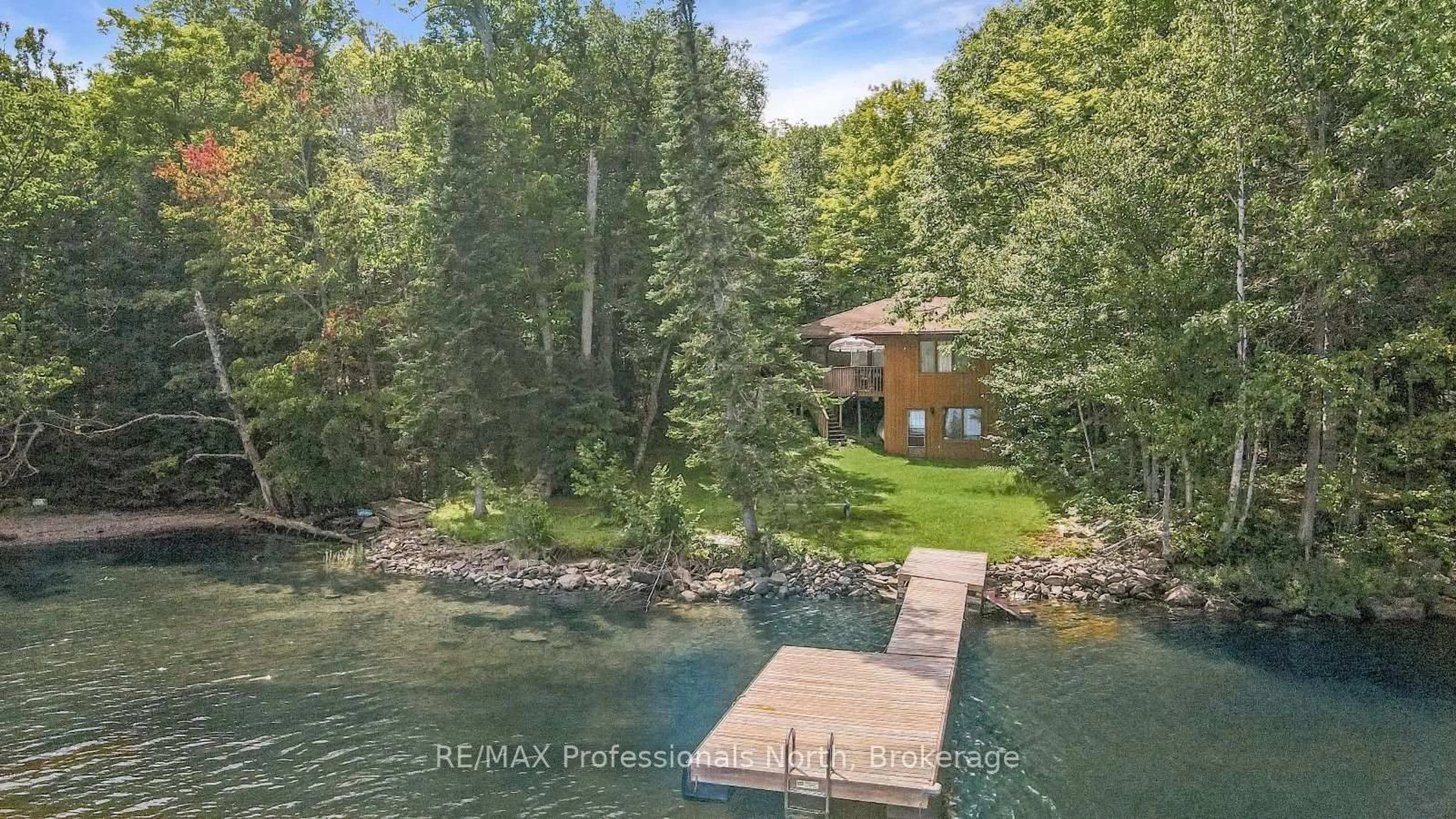 A pic from outside/outdoor area/front of a property/back of a property/a pic from drone, water/lake/river/ocean view for 3382 Kushog Lake Rd, Algonquin Highlands Ontario K0M 1S0