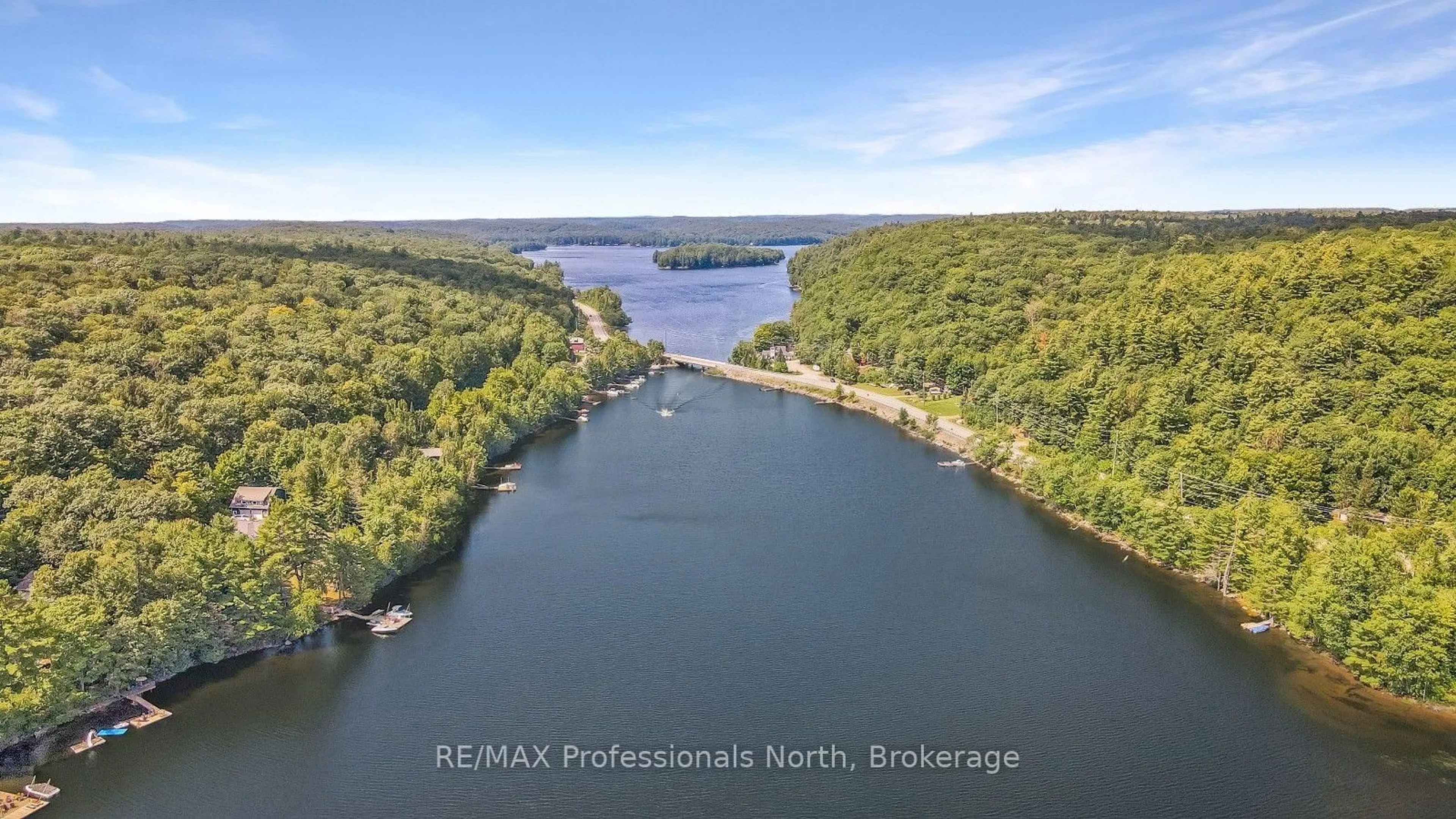 A pic from outside/outdoor area/front of a property/back of a property/a pic from drone, water/lake/river/ocean view for 3382 Kushog Lake Rd, Algonquin Highlands Ontario K0M 1S0