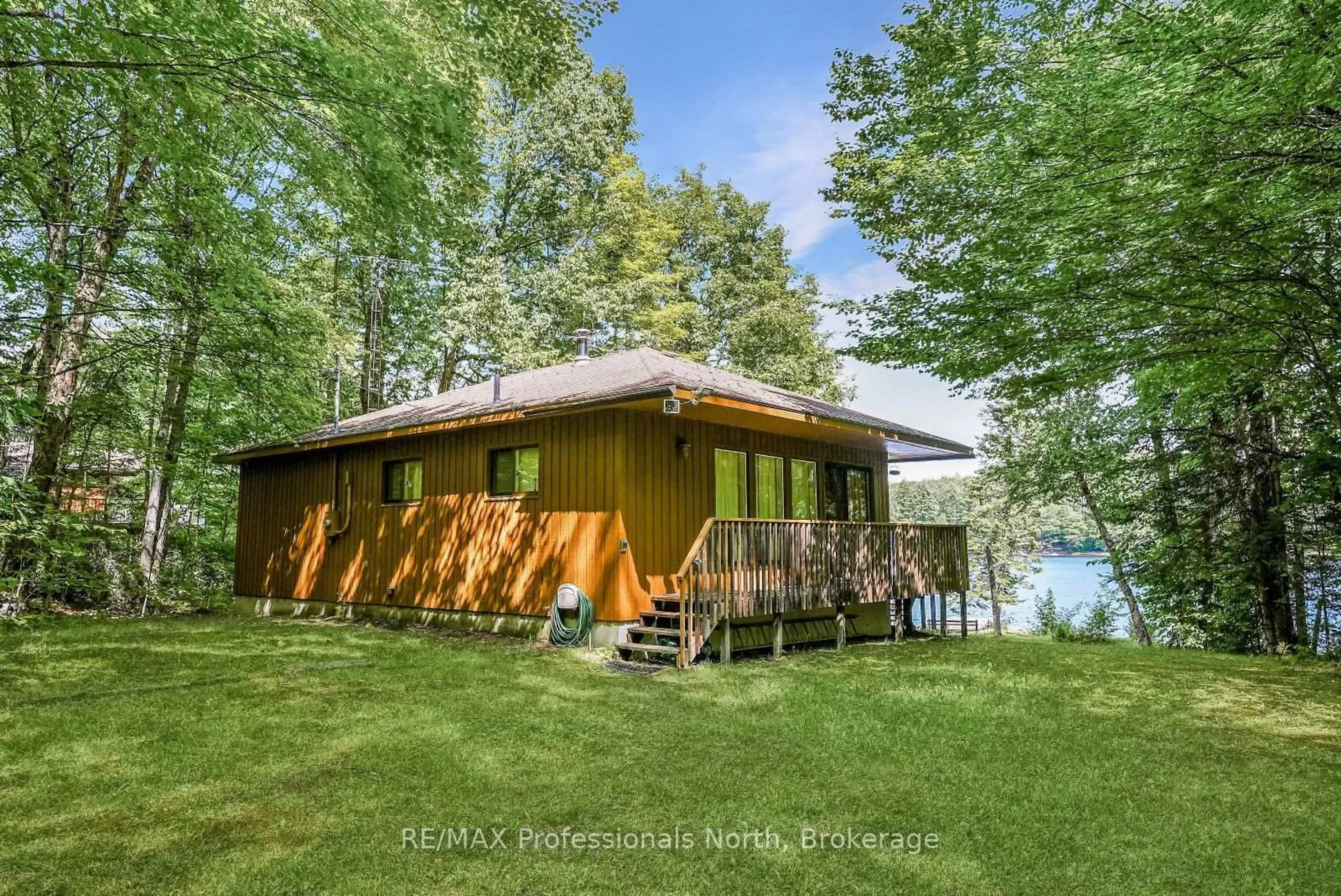 A pic from outside/outdoor area/front of a property/back of a property/a pic from drone, water/lake/river/ocean view for 3382 Kushog Lake Rd, Algonquin Highlands Ontario K0M 1S0