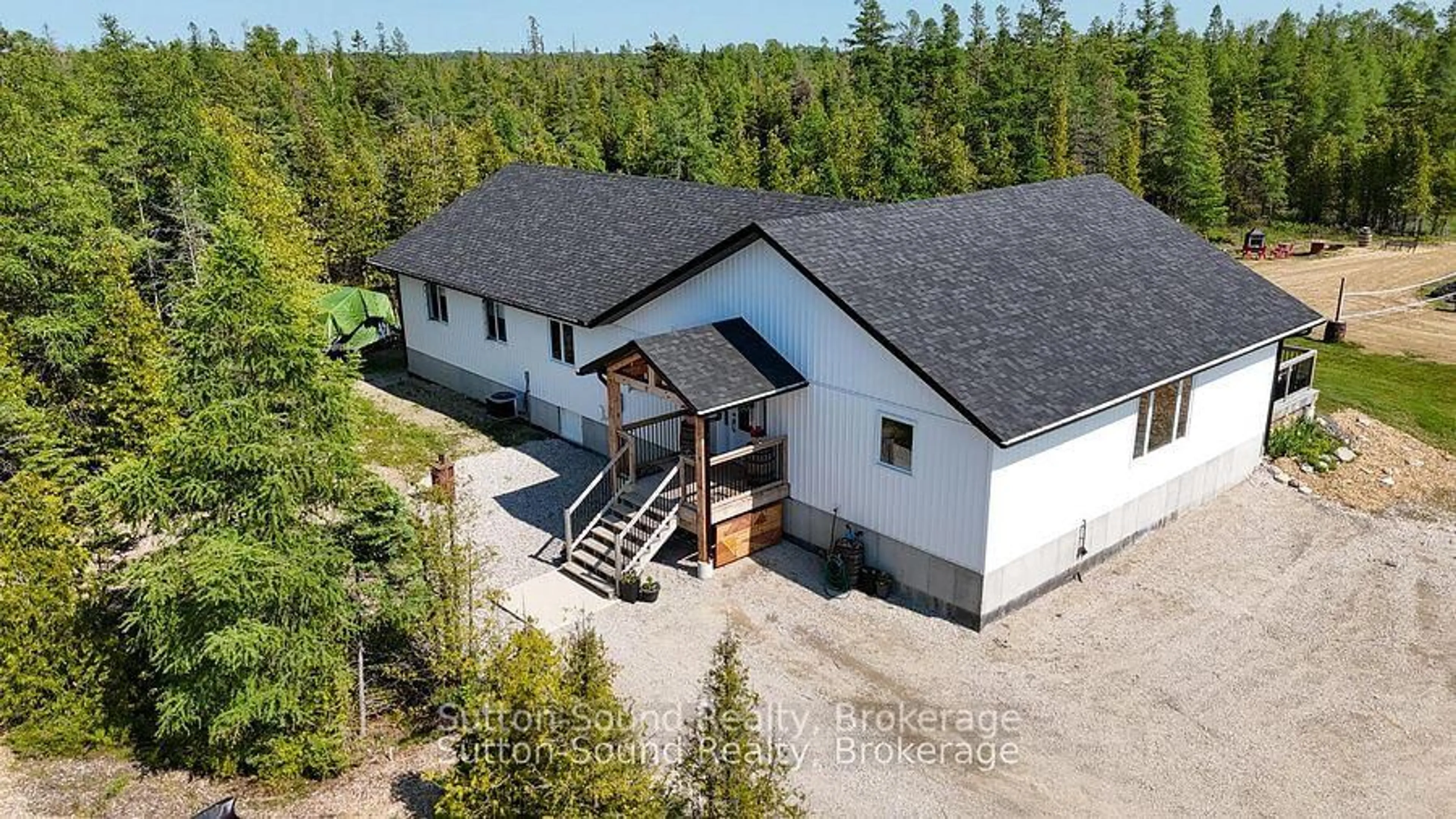 A pic from outside/outdoor area/front of a property/back of a property/a pic from drone, building for 107 Whiskey Harbour Rd, Northern Bruce Peninsula Ontario N0H 2T0