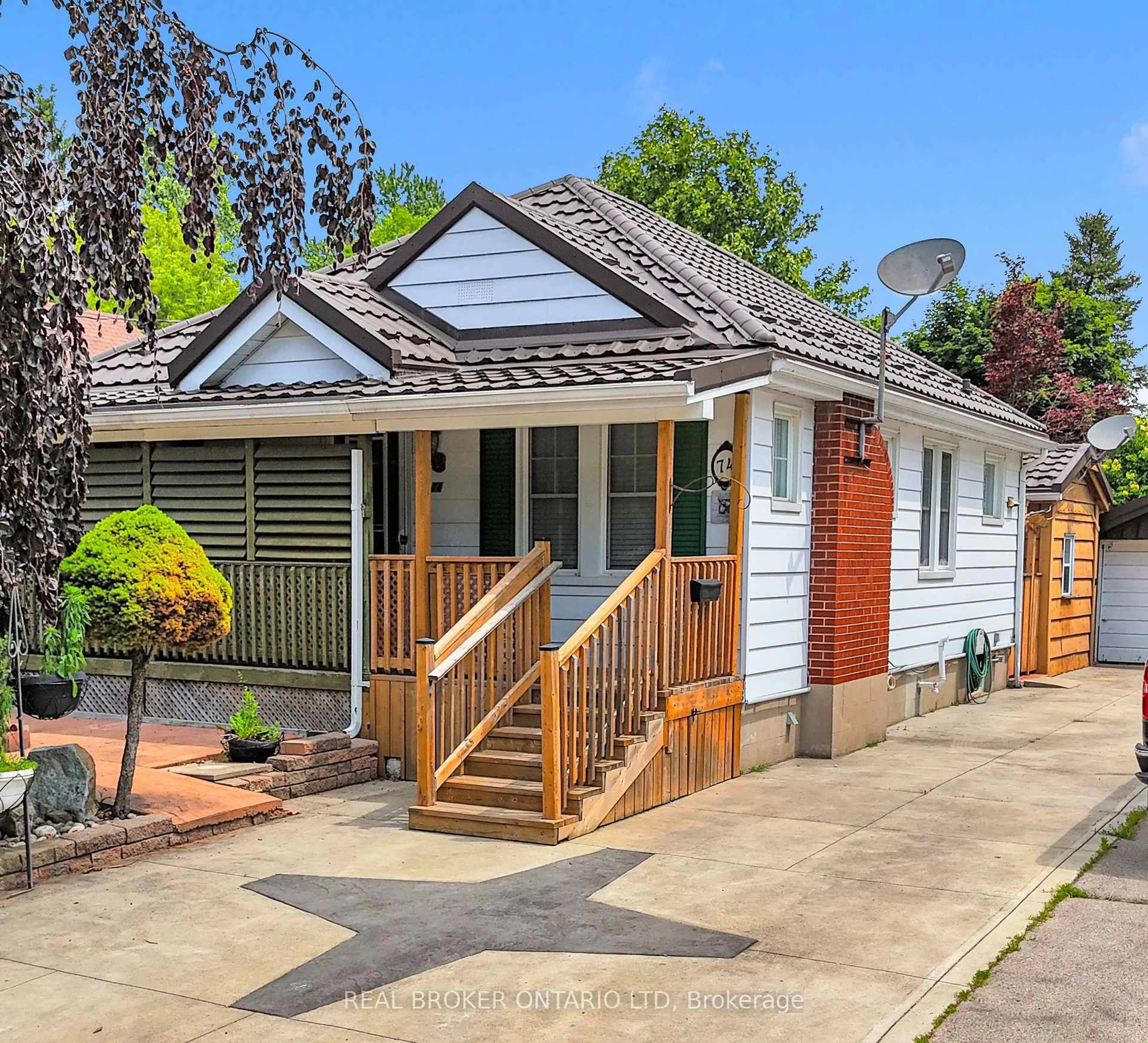 Home with vinyl exterior material, street for 74 Sterling St, London East Ontario N5Y 1Y7
