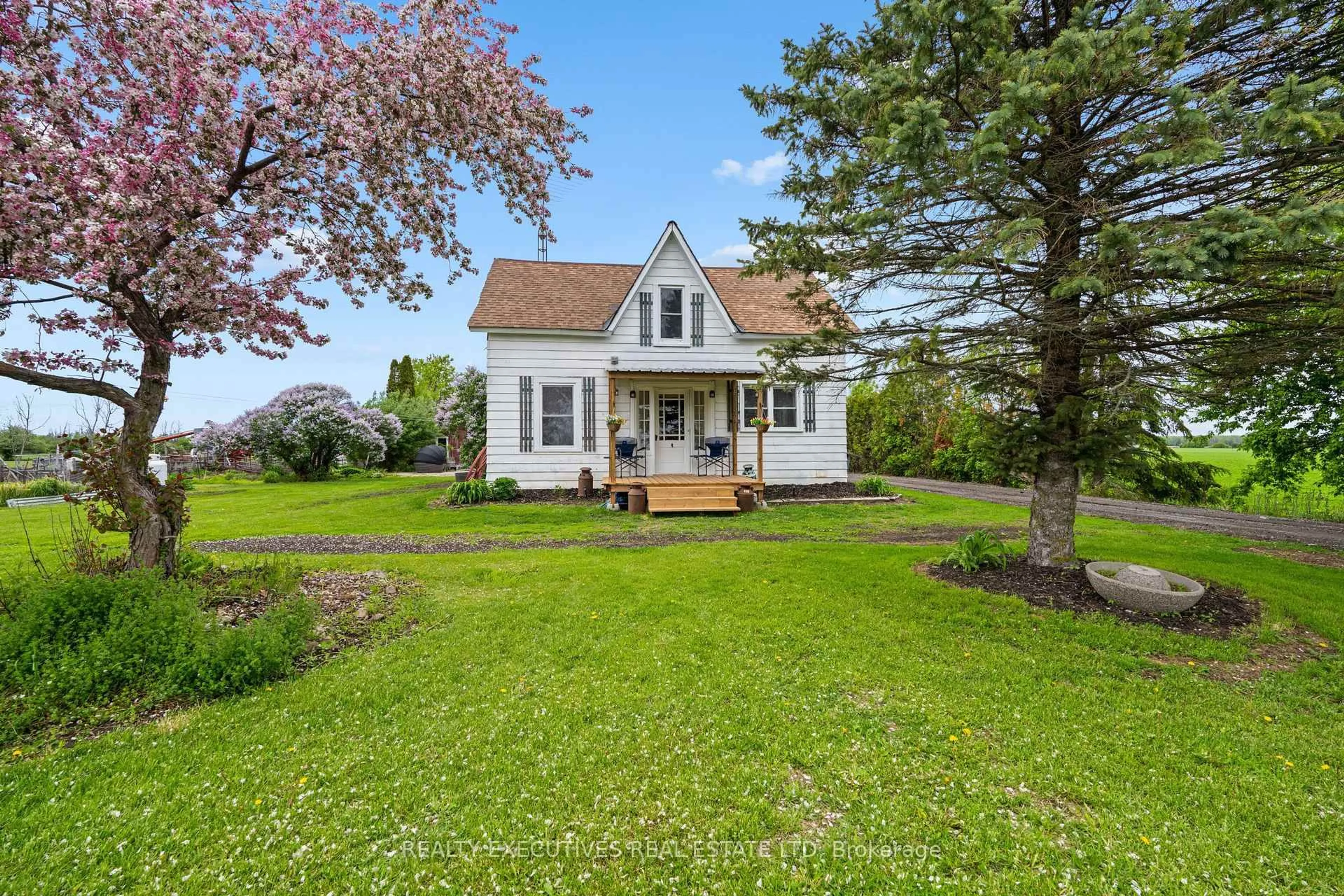 A pic from outside/outdoor area/front of a property/back of a property/a pic from drone, street for 12689 River Rd, North Dundas Ontario K0C 2K0