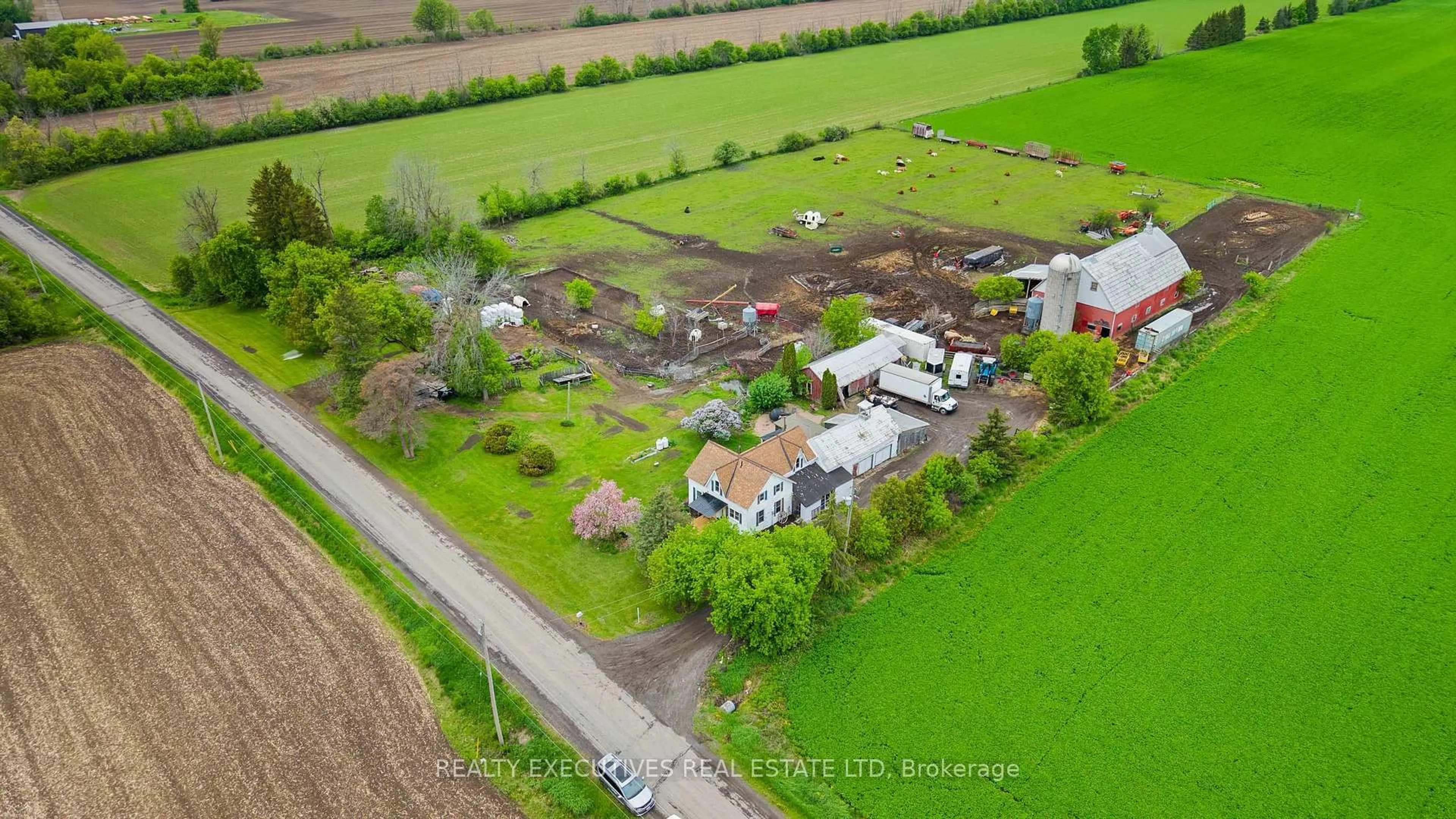 A pic from outside/outdoor area/front of a property/back of a property/a pic from drone, street for 12689 River Rd, North Dundas Ontario K0C 2K0