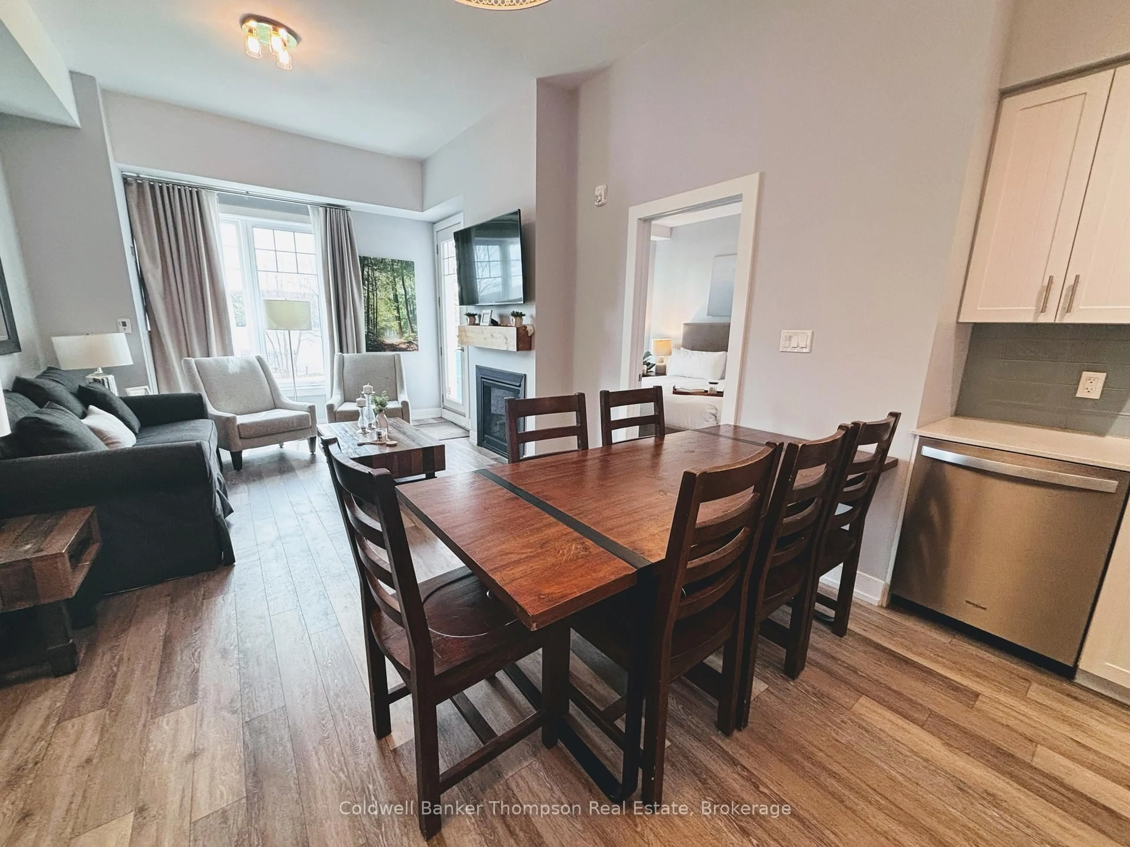 Dining room, wood/laminate floor for 25 Pen Lake Point Rd #003, Huntsville Ontario P1H 1A9