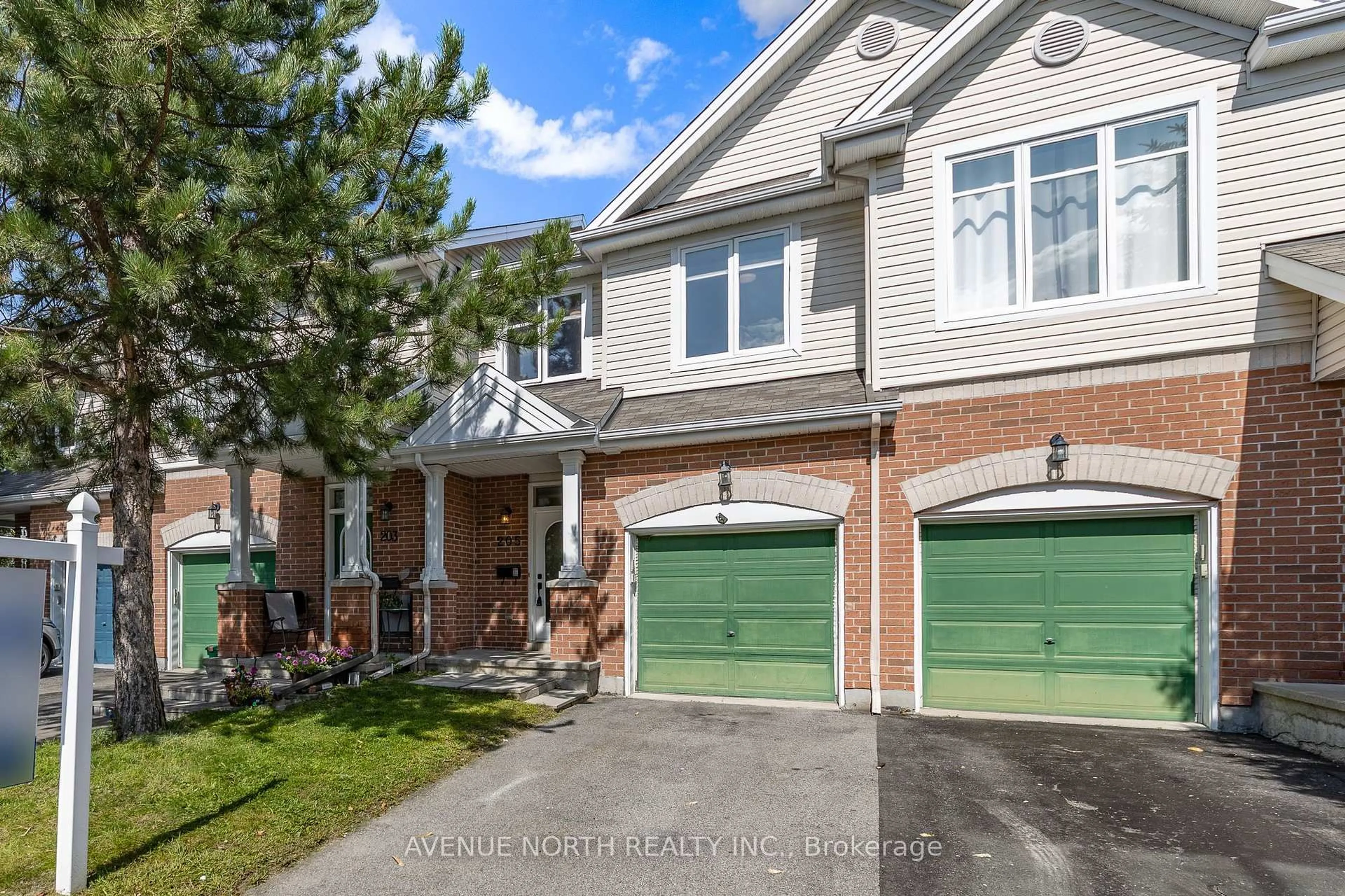 Home with brick exterior material, street for 205 Hidden Meadow Ave, Ottawa Ontario K1T 0C2
