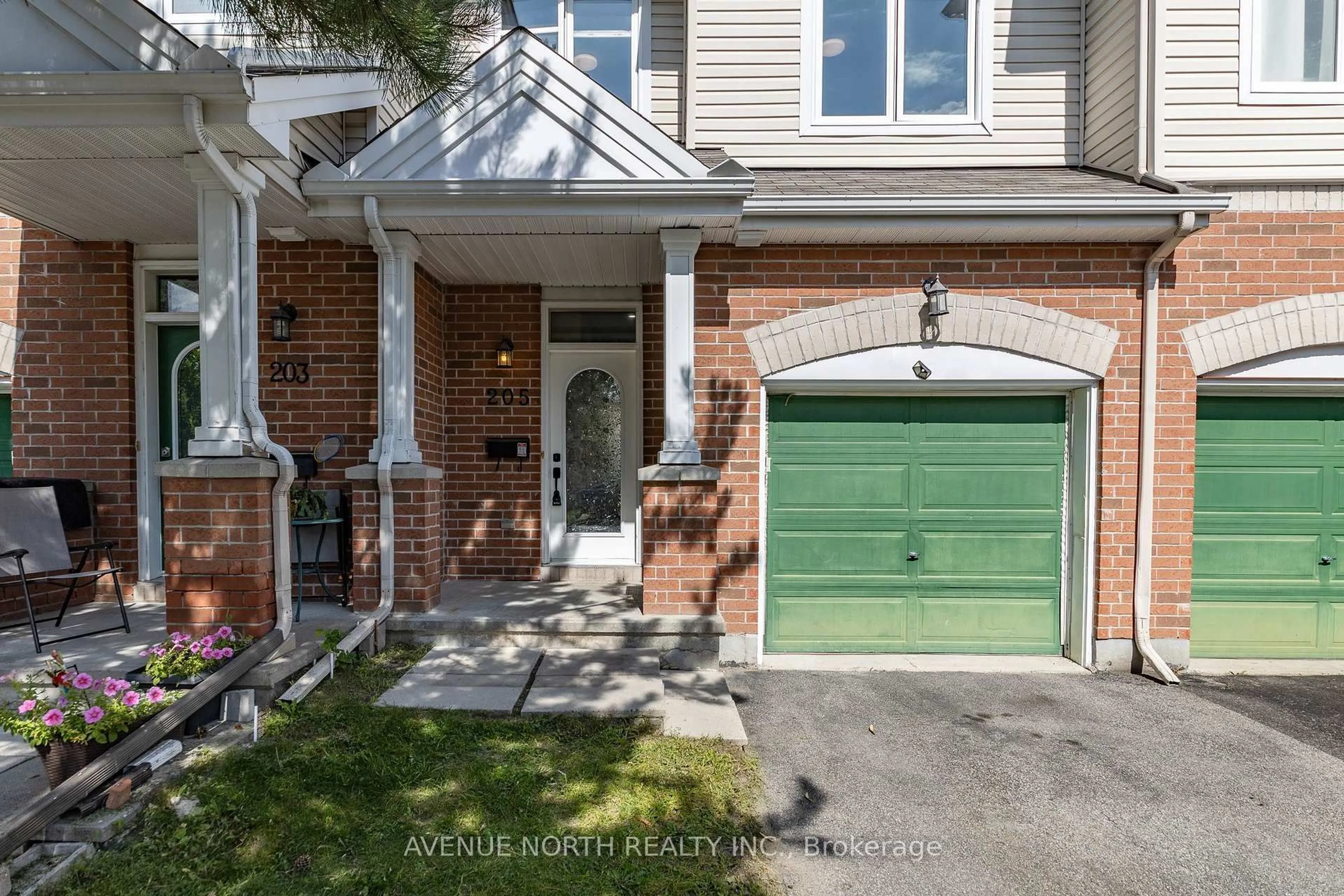 Home with brick exterior material, street for 205 Hidden Meadow Ave, Ottawa Ontario K1T 0C2