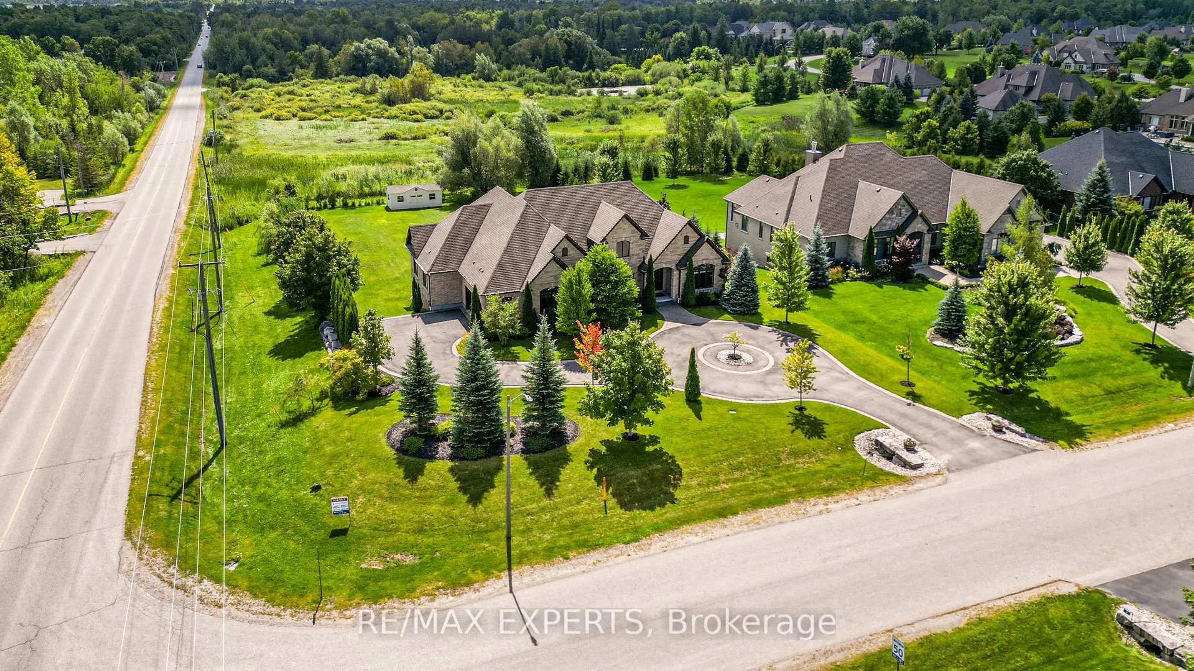 A pic from outside/outdoor area/front of a property/back of a property/a pic from drone, mountain view for 10 Old Ruby Lane, Puslinch Ontario N0B 2J0