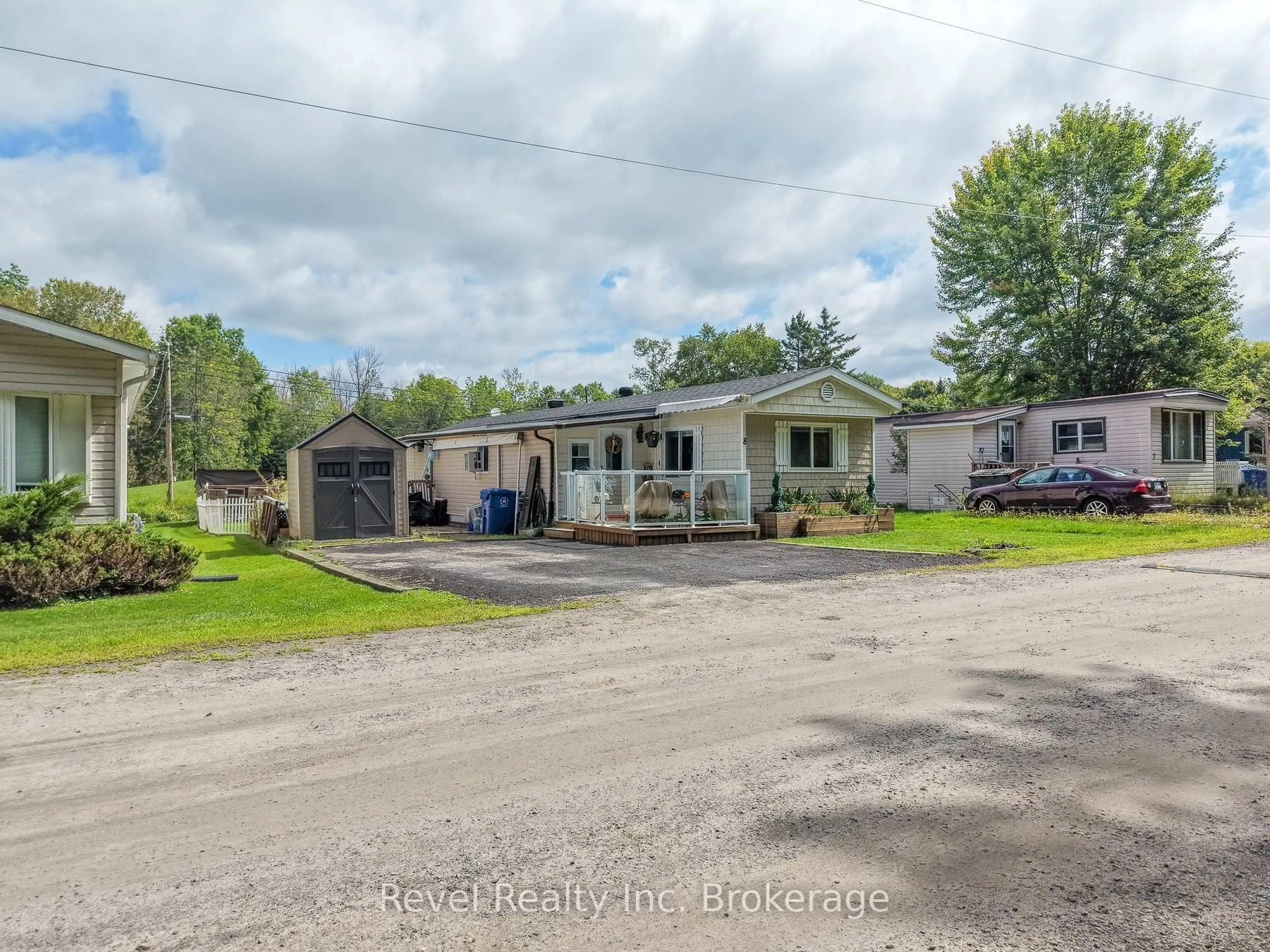 A pic from outside/outdoor area/front of a property/back of a property/a pic from drone, unknown for 395 Riverbend Rd #8, North Bay Ontario P1B 8Z4