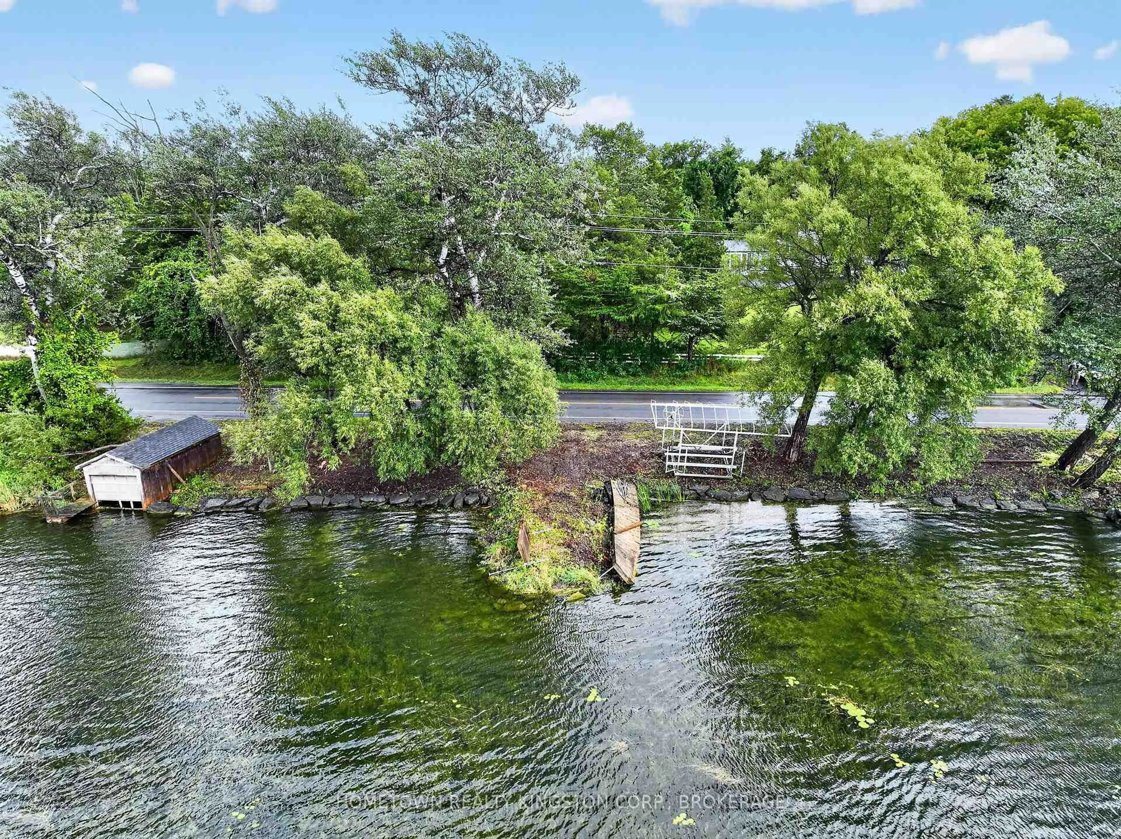 A pic from outside/outdoor area/front of a property/back of a property/a pic from drone, water/lake/river/ocean view for 1024 South Shore Rd, Napanee Ontario K7R 3K7