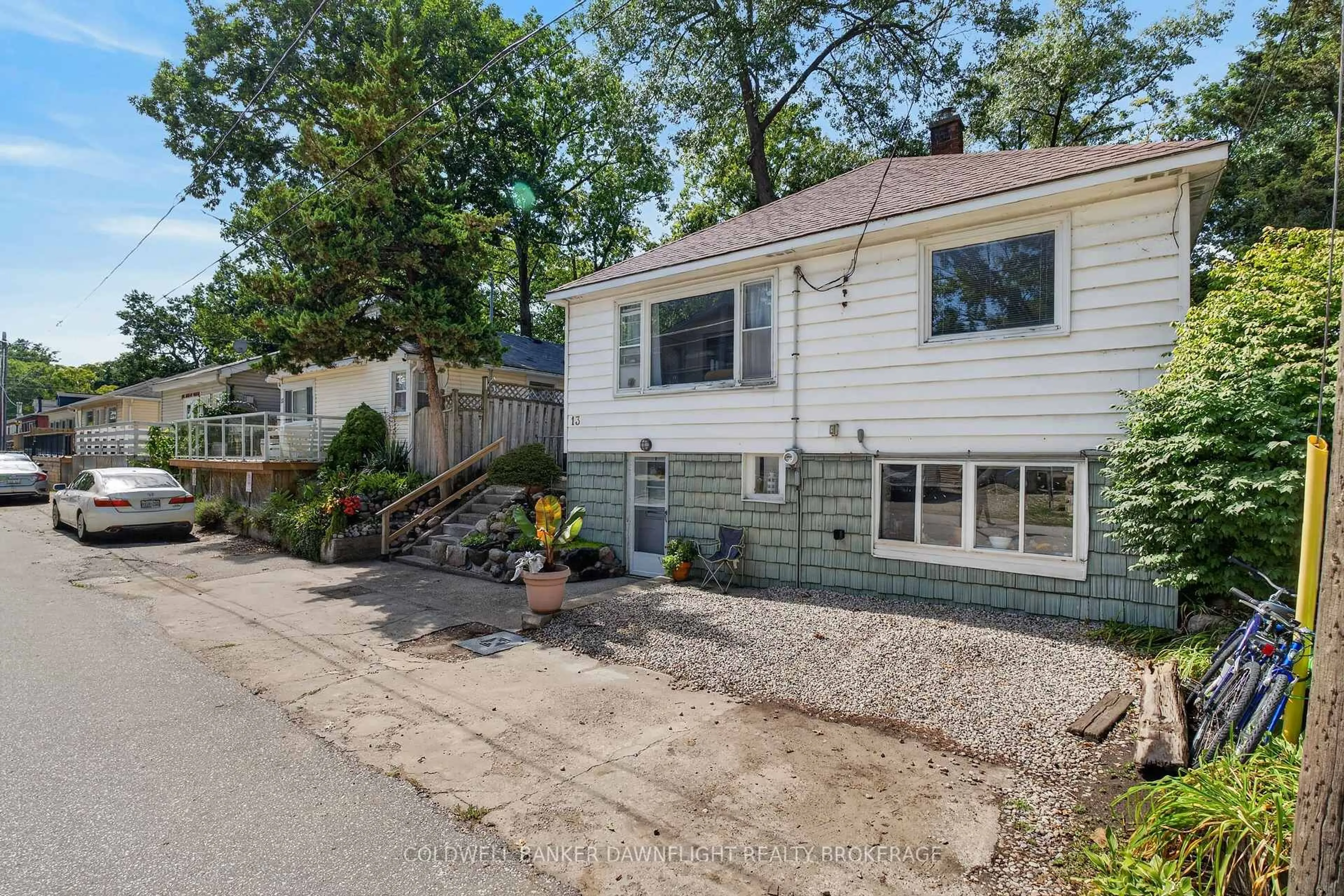 Home with vinyl exterior material, street for 13 Warwick Ave, Lambton Shores Ontario N0M 1T0
