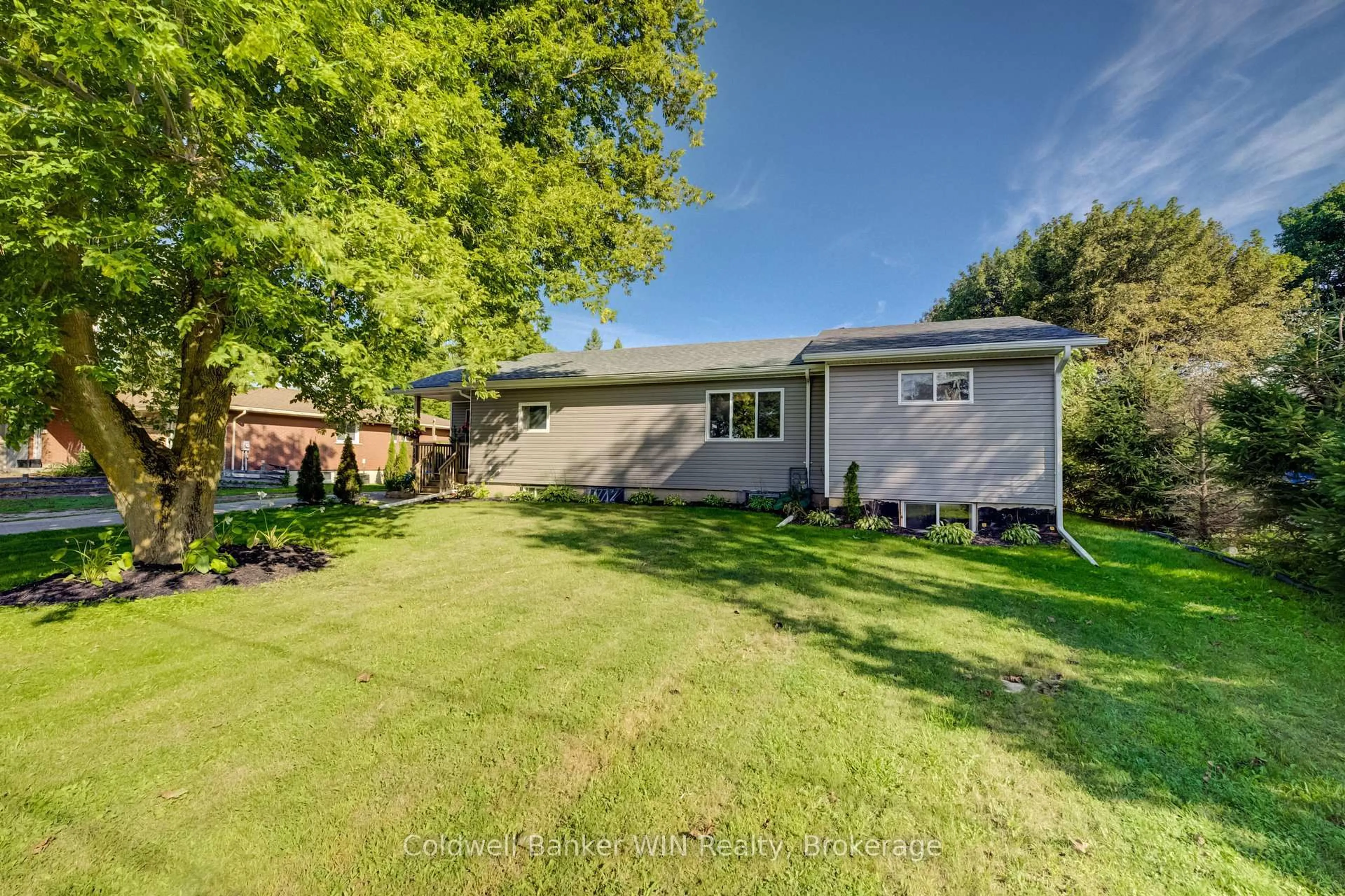 A pic from outside/outdoor area/front of a property/back of a property/a pic from drone, street for 340 Sligo Rd, Wellington North Ontario N0G 2L1