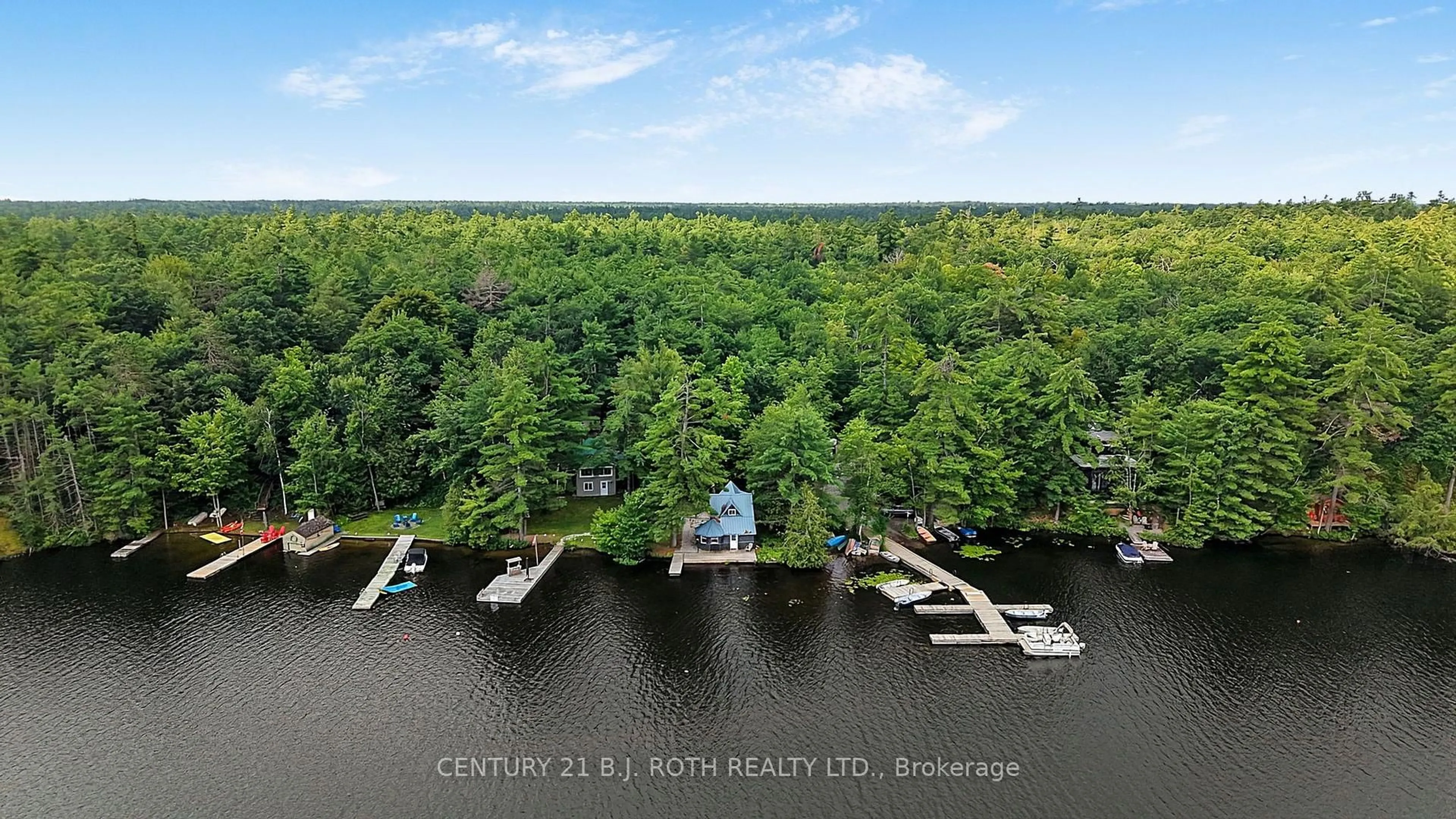 A pic from outside/outdoor area/front of a property/back of a property/a pic from drone, water/lake/river/ocean view for 1100 Hewitt St, Gravenhurst Ontario P1P 0C1