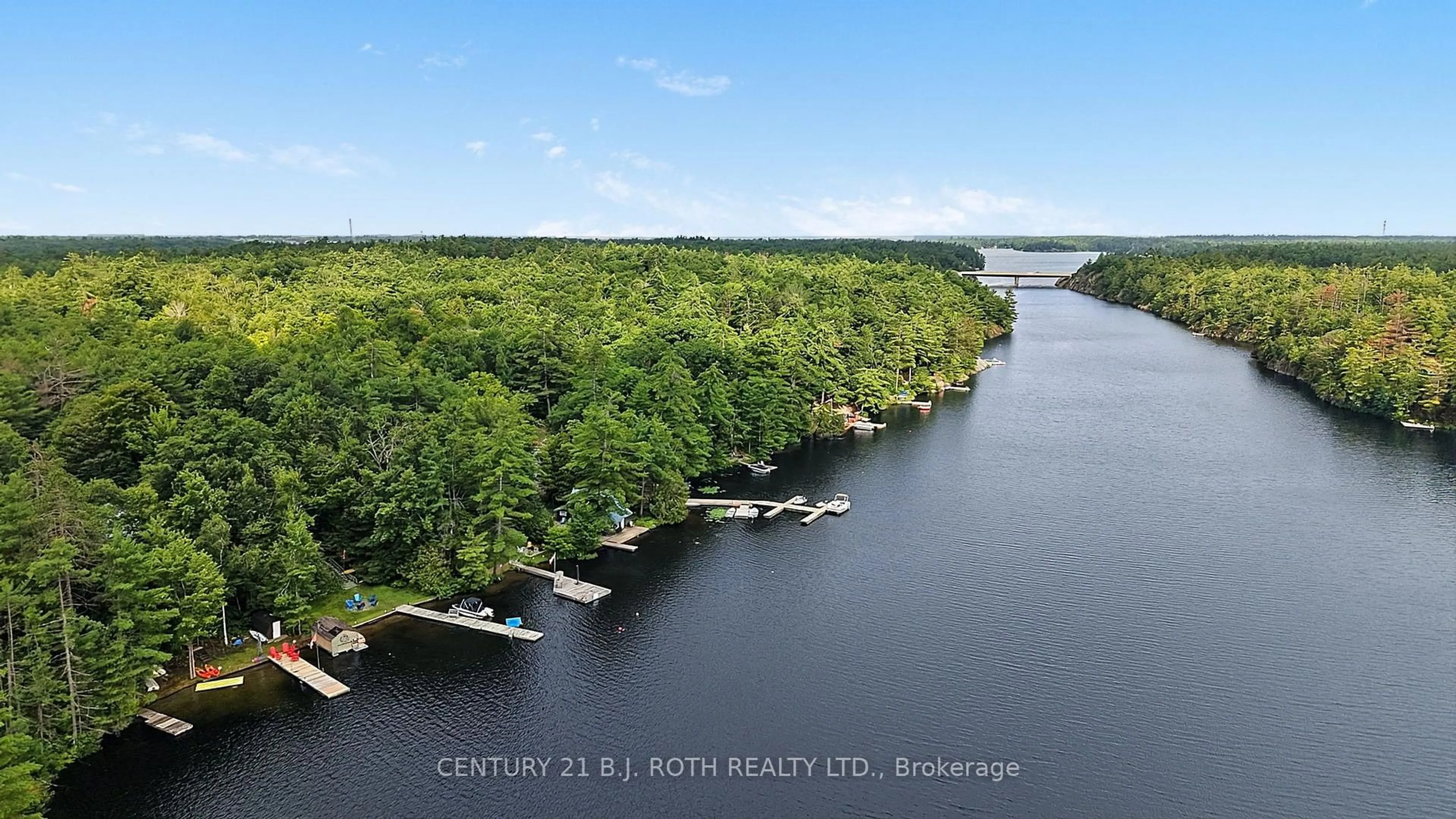 A pic from outside/outdoor area/front of a property/back of a property/a pic from drone, water/lake/river/ocean view for 1100 Hewitt St, Gravenhurst Ontario P1P 0C1