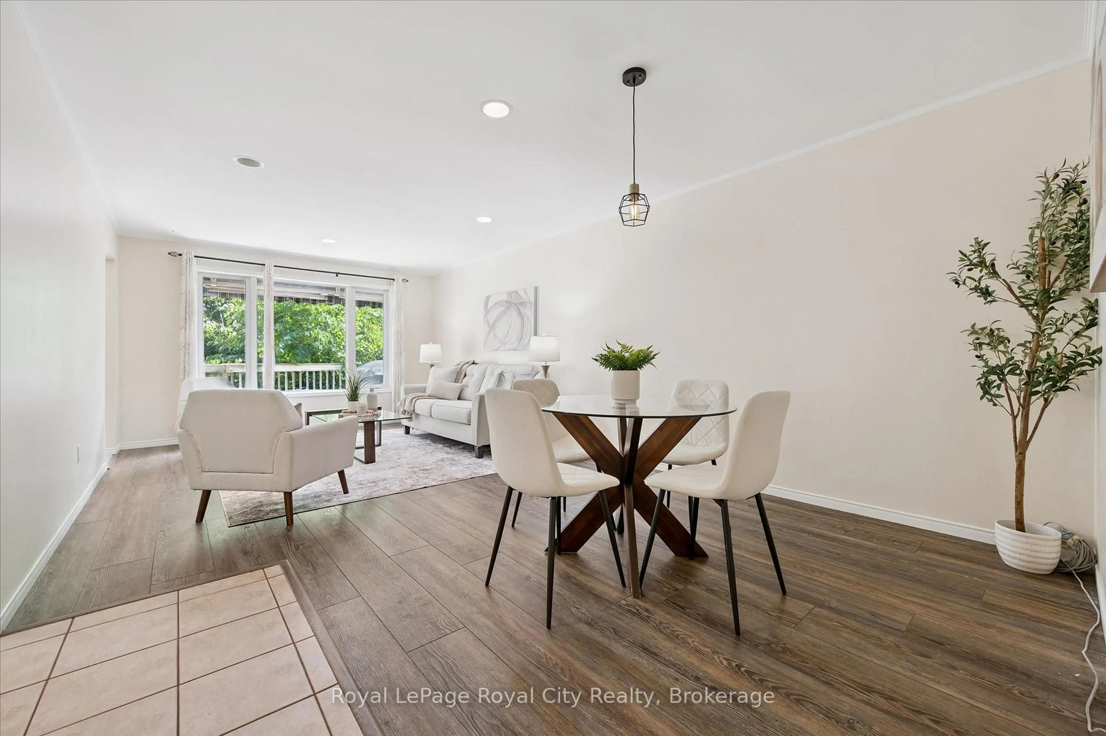 Dining room, wood/laminate floor for 73 Waxwing Cres, Guelph Ontario N1C 1E3