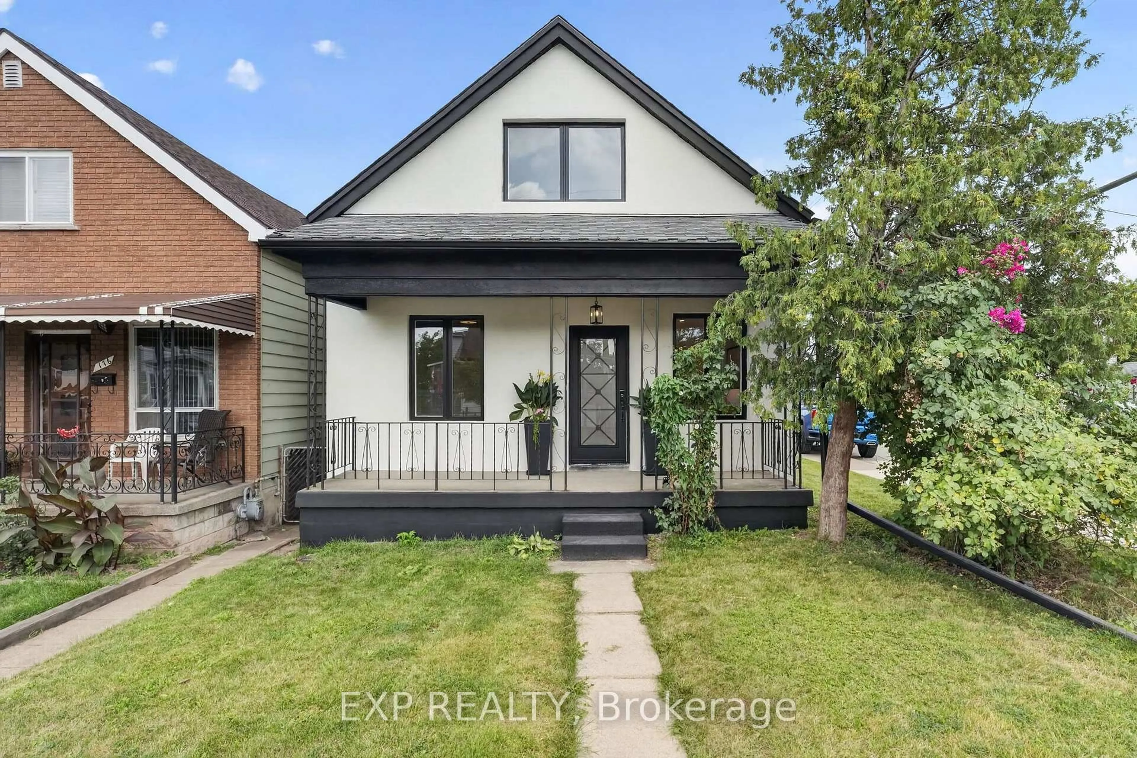 Home with brick exterior material, street for 174 London St, Hamilton Ontario L8H 4C2