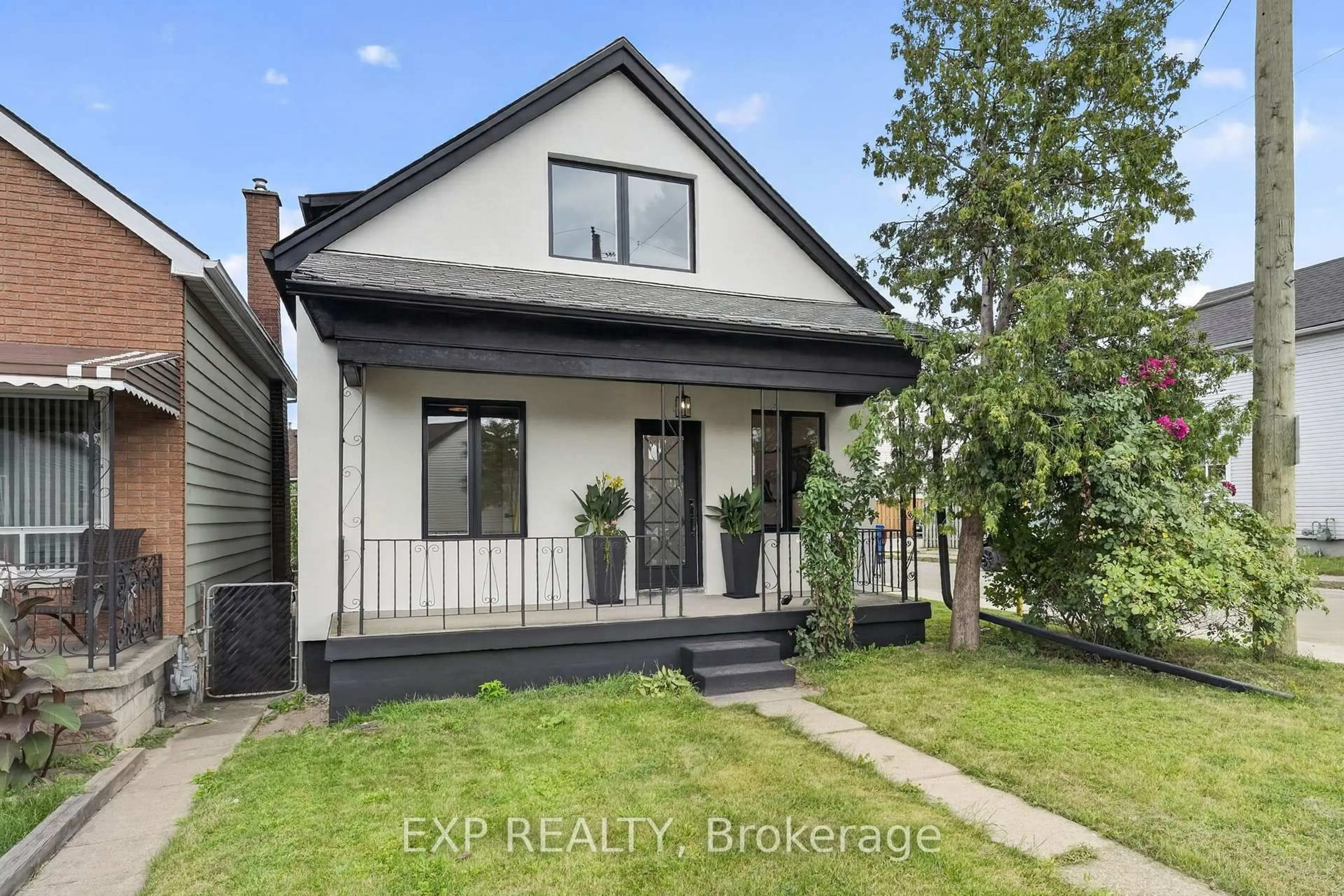 Home with brick exterior material, street for 174 London St, Hamilton Ontario L8H 4C2