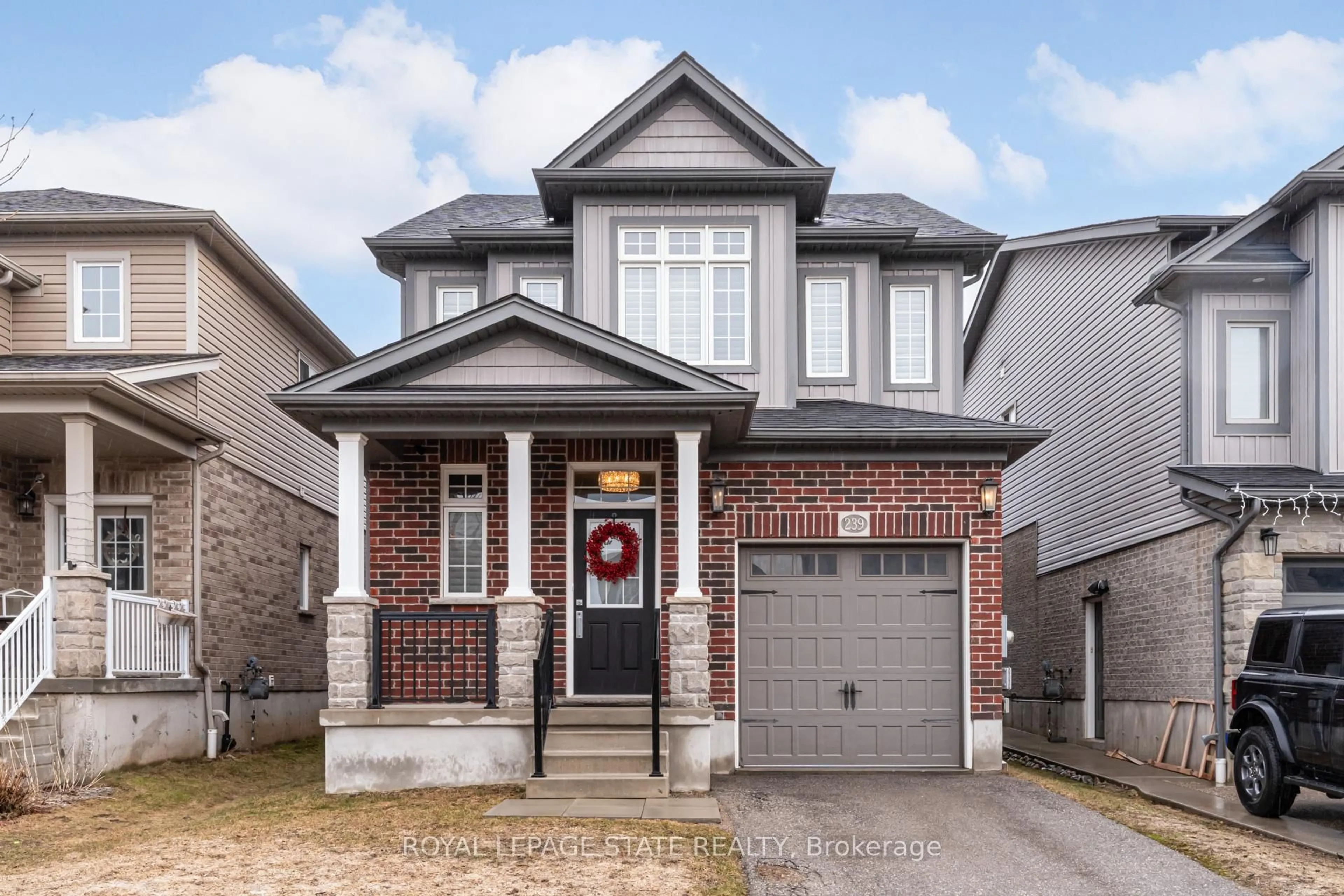 Home with brick exterior material, street for 239 Cranbrook St, Kitchener Ontario N2P 0B5