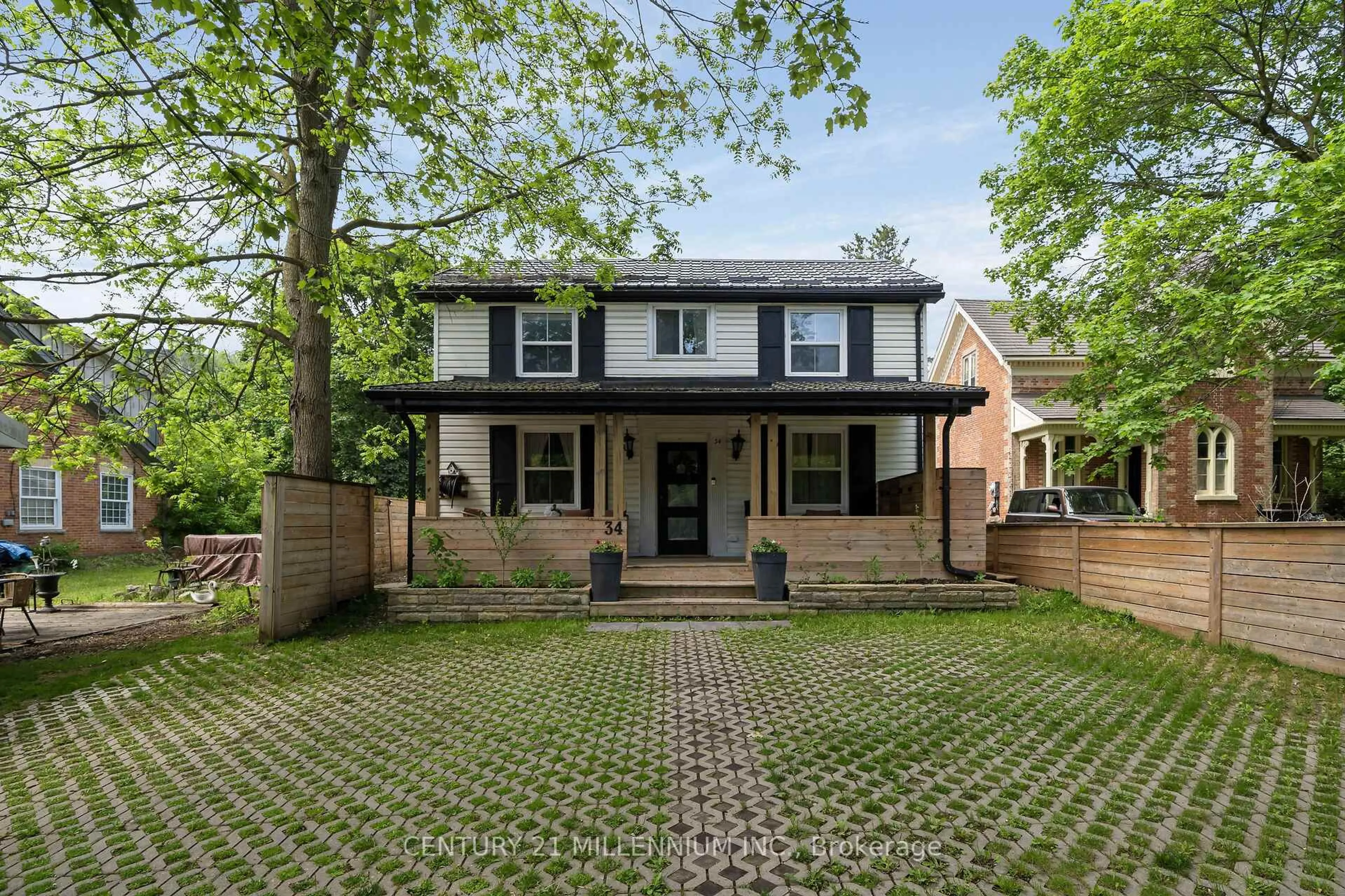 Home with brick exterior material, street for 34 Main St, Erin Ontario N0B 1T0