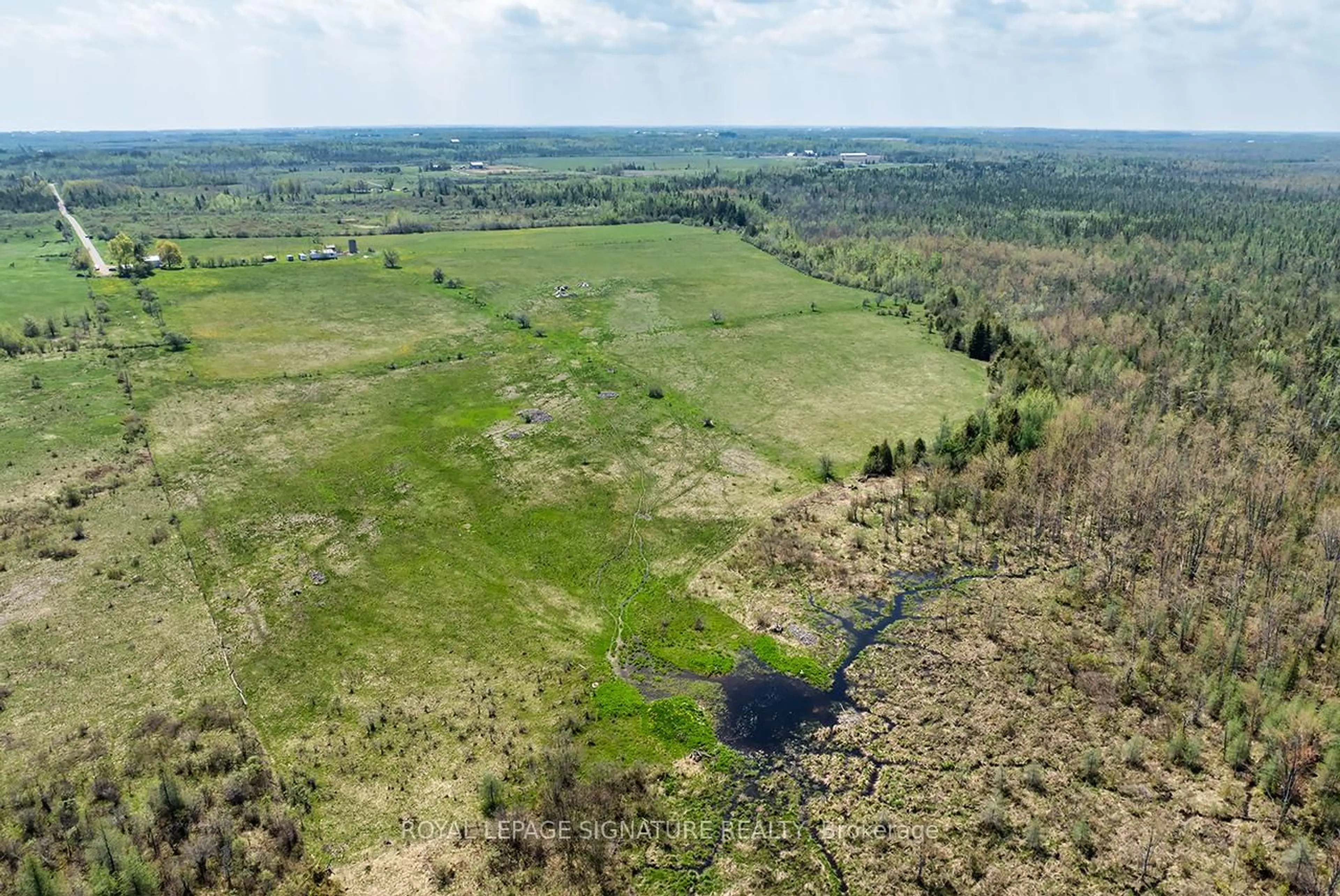 A pic from outside/outdoor area/front of a property/back of a property/a pic from drone, water/lake/river/ocean view for 1007 Moor Rd, Kawartha Lakes Ontario K0M 2T0