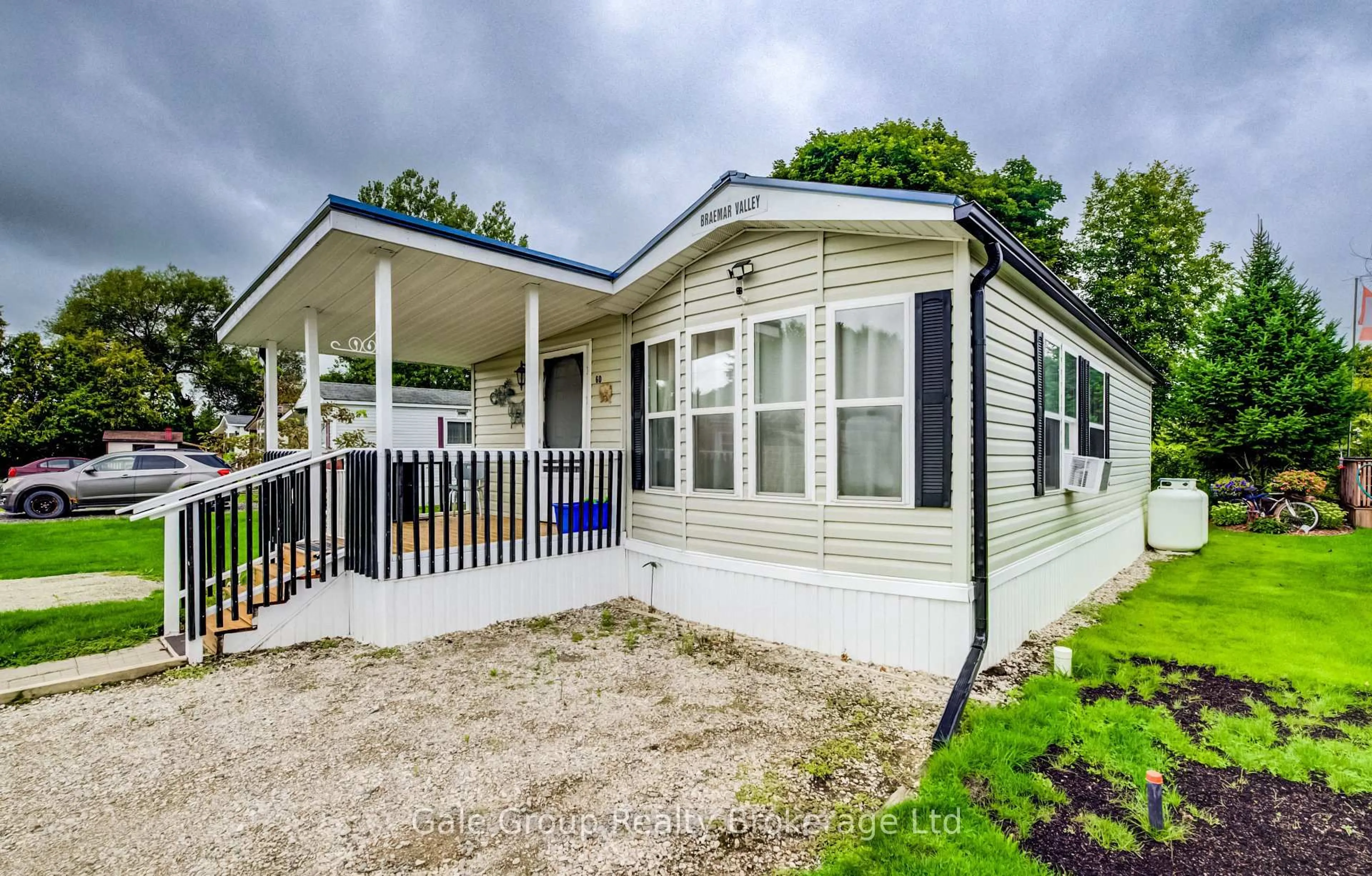 Home with vinyl exterior material, street for 495856 10th Line #60, East Zorra-Tavistock Ontario N4S 7V7