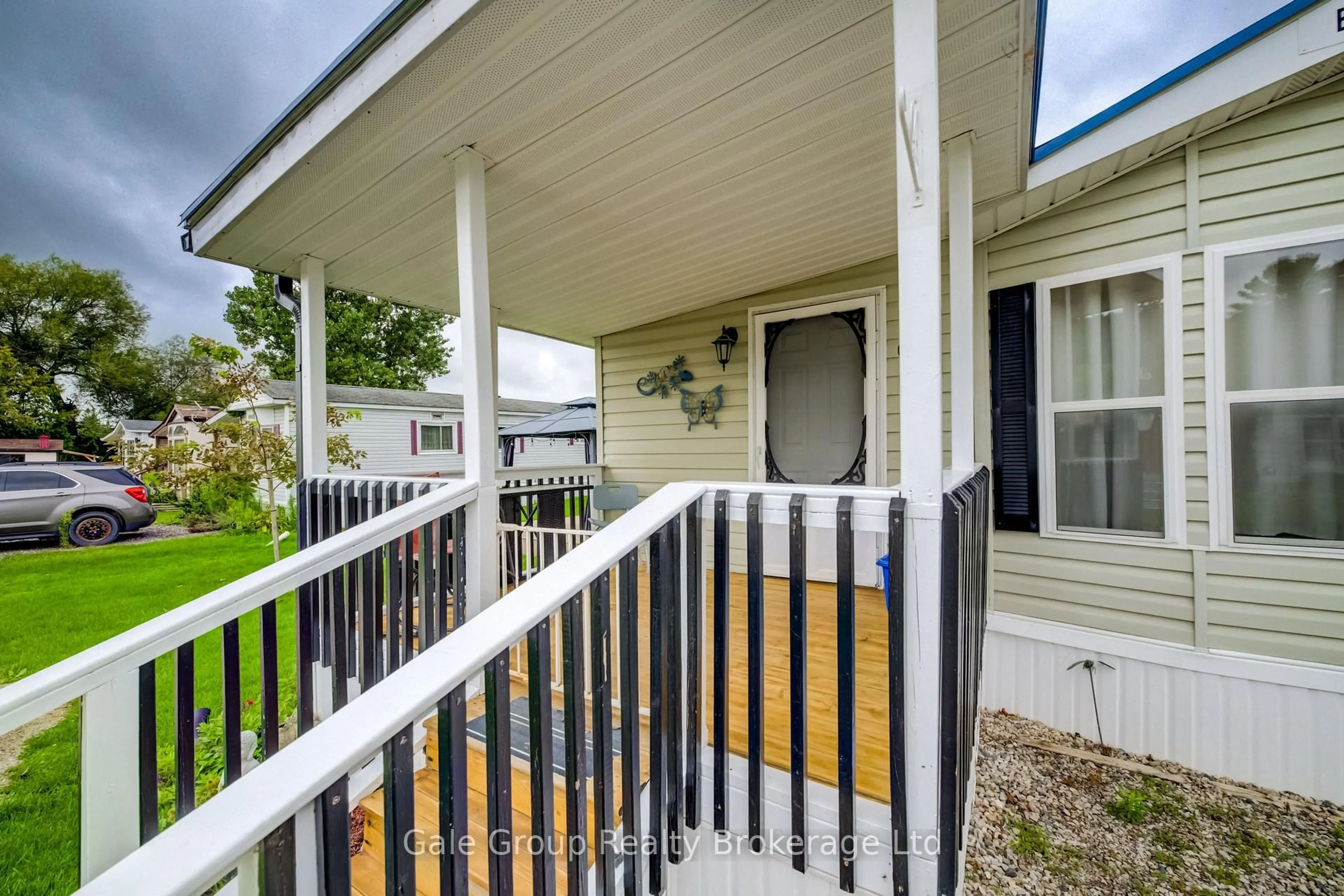 Home with vinyl exterior material, street for 495856 10th Line #60, East Zorra-Tavistock Ontario N4S 7V7