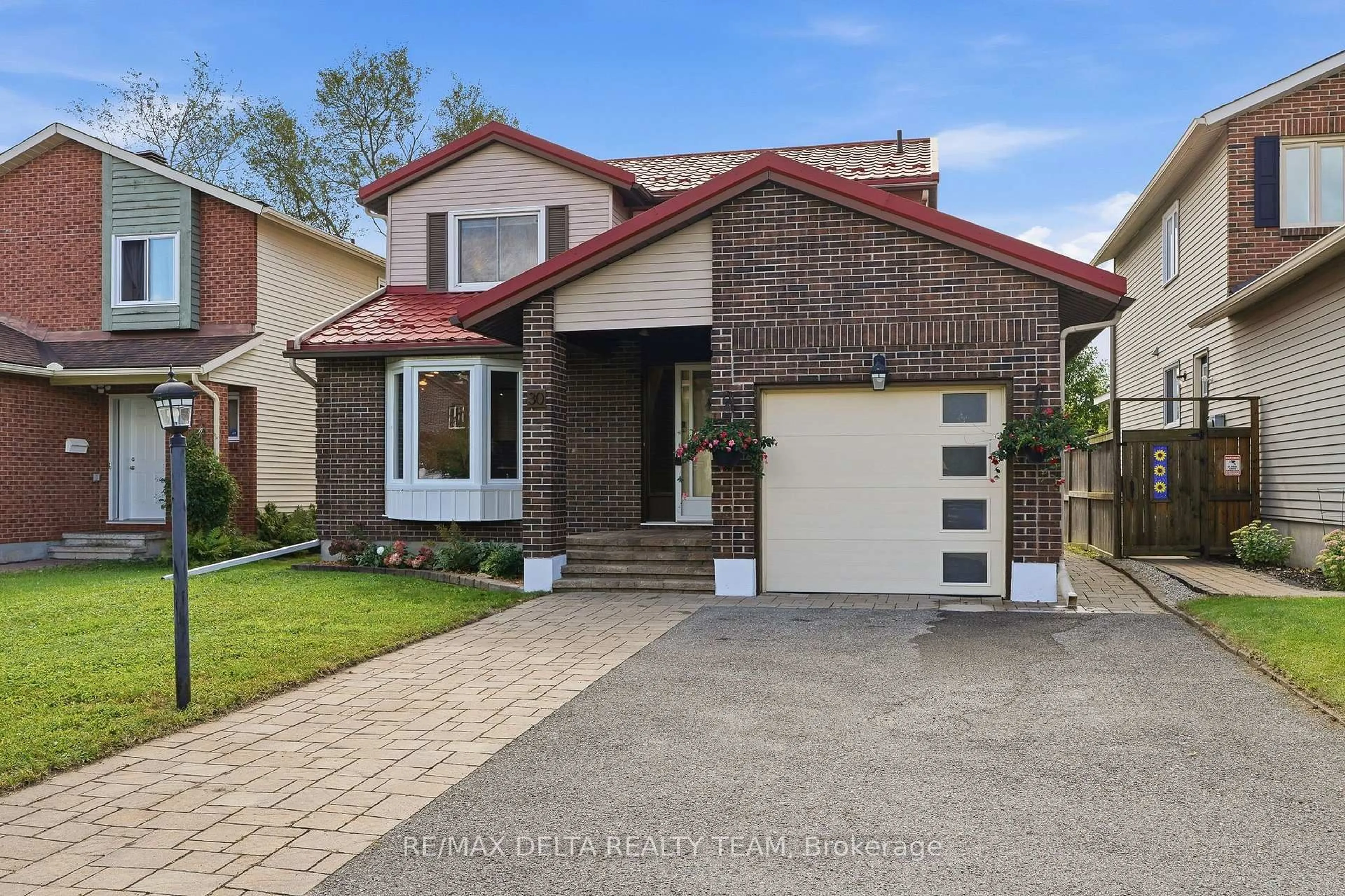 Home with brick exterior material, street for 30 Homestead St, Nepean Ontario K2E 7N8
