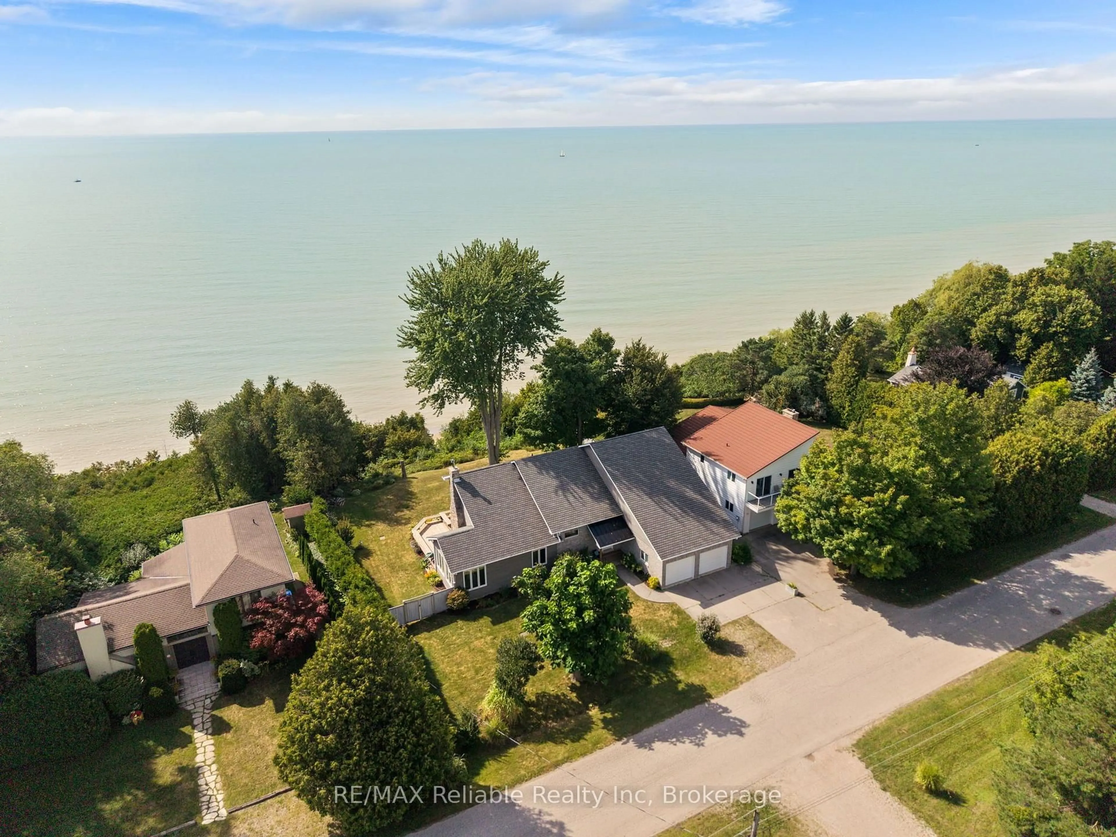 A pic from outside/outdoor area/front of a property/back of a property/a pic from drone, water/lake/river/ocean view for 113 Tuyll St, Bluewater Ontario N0M 1G0