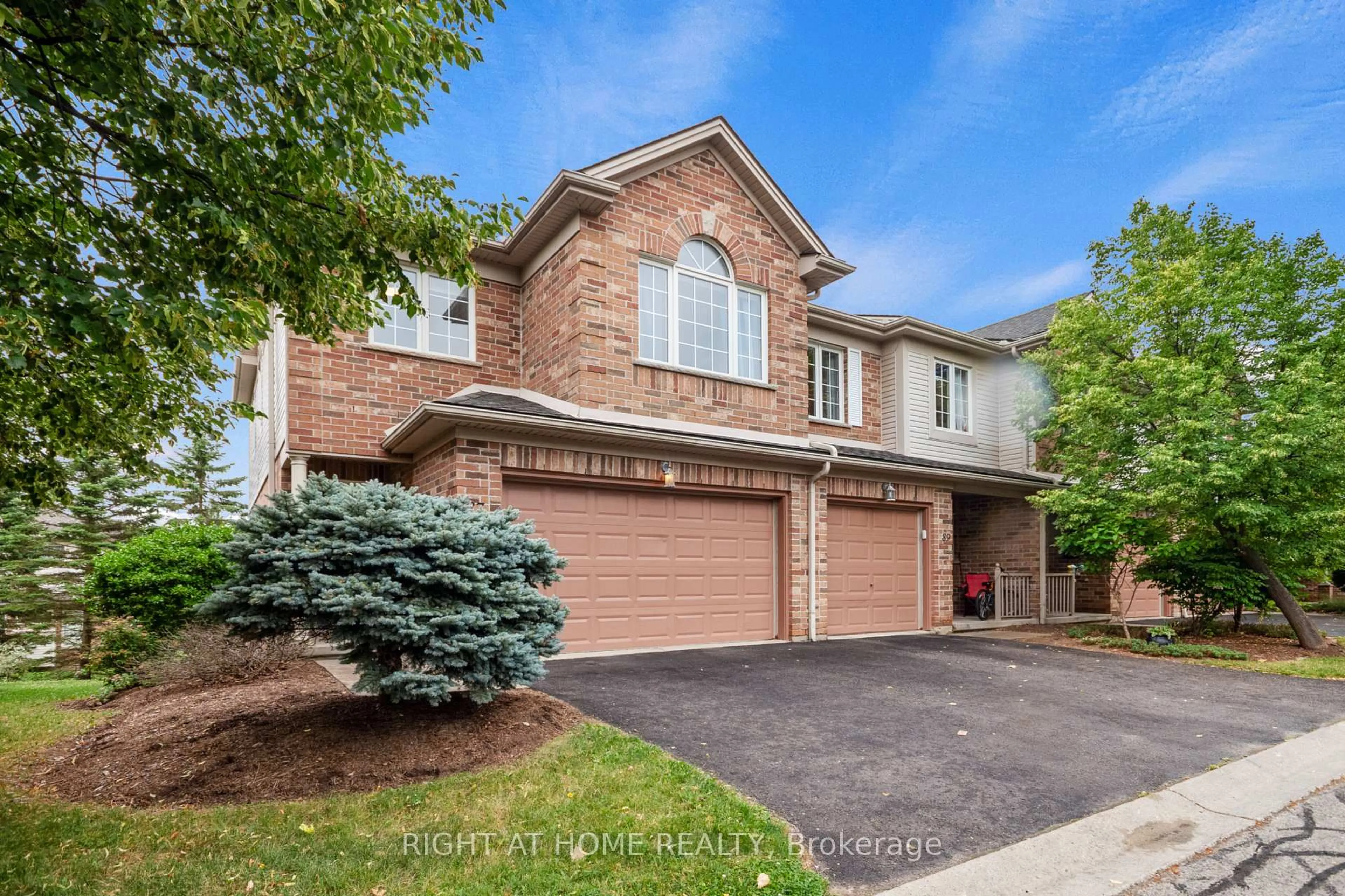 Home with brick exterior material, street for 320 Ambleside Dr #87, London North Ontario N6G 5H8