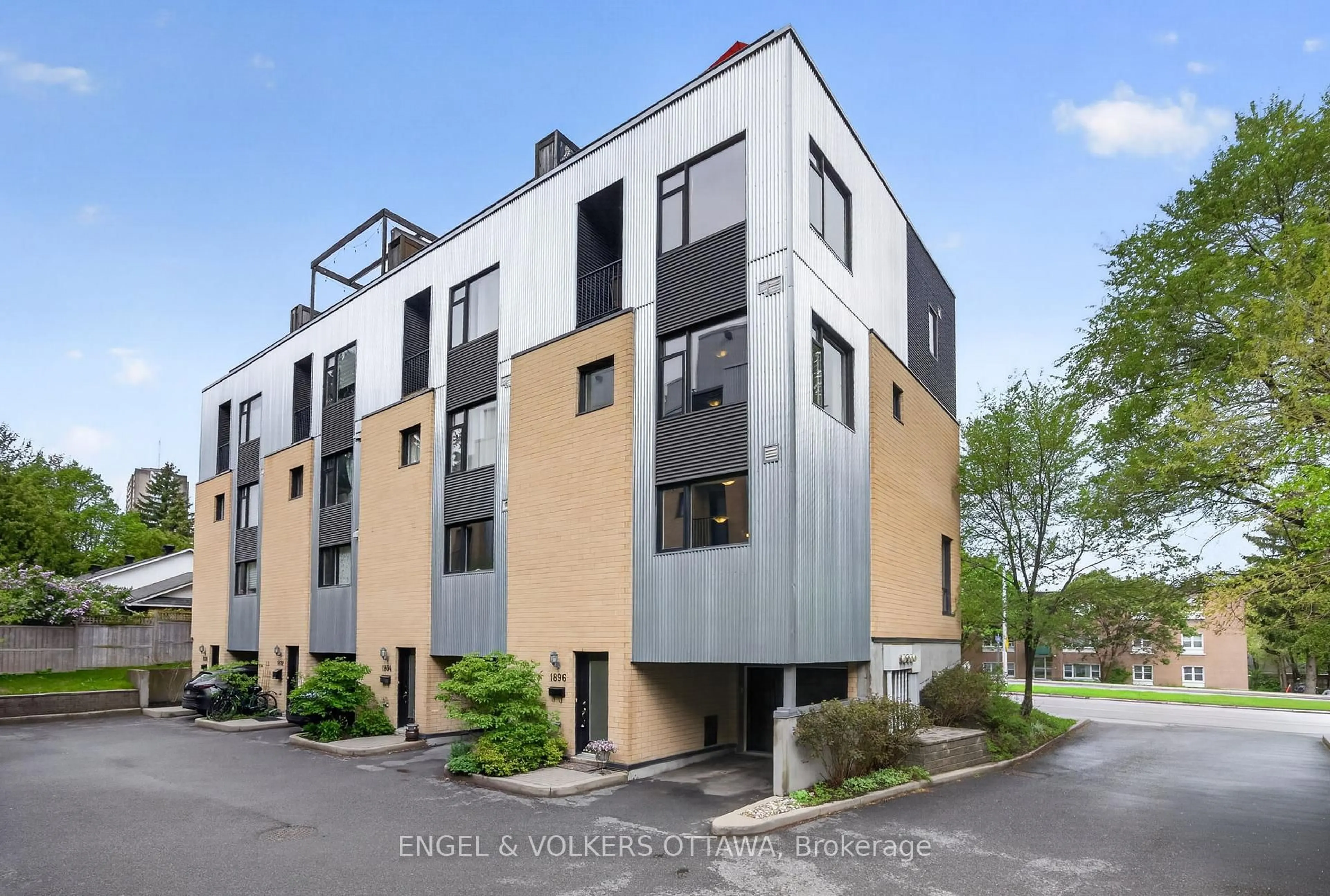 A pic from outside/outdoor area/front of a property/back of a property/a pic from drone, street for 1896 Carling Ave, Ottawa Ontario K2A 1E7