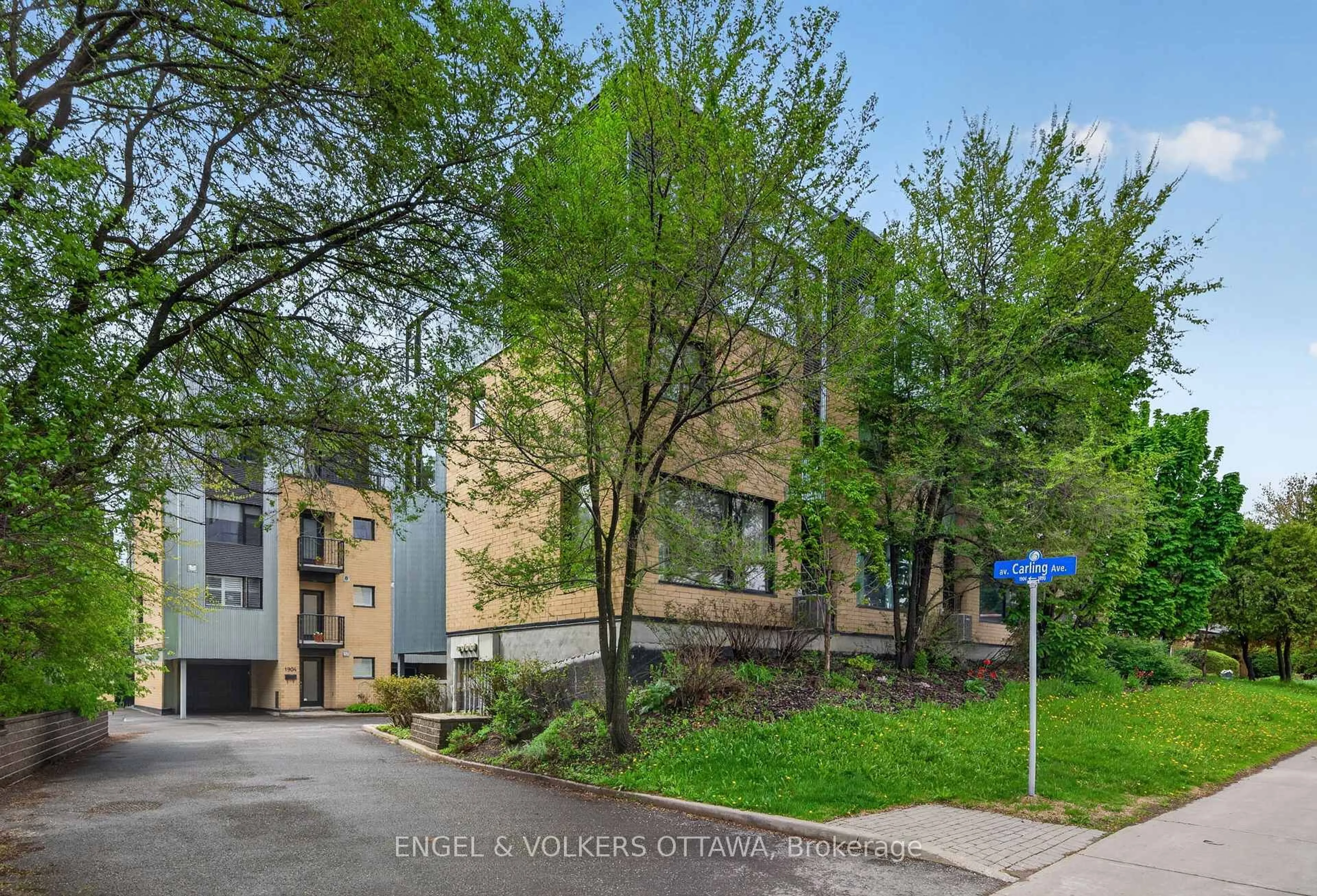 A pic from outside/outdoor area/front of a property/back of a property/a pic from drone, street for 1896 Carling Ave, Ottawa Ontario K2A 1E7
