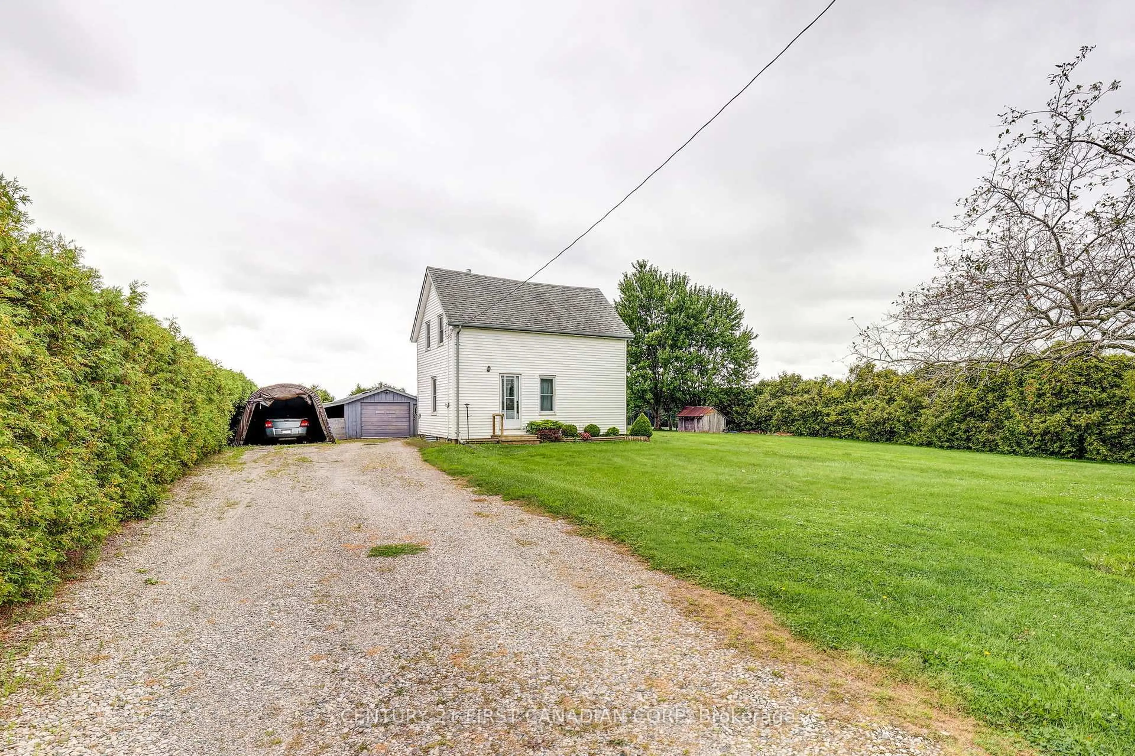 A pic from outside/outdoor area/front of a property/back of a property/a pic from drone, street for 45687 Fruit Ridge Line, Central Elgin Ontario N5P 3S9