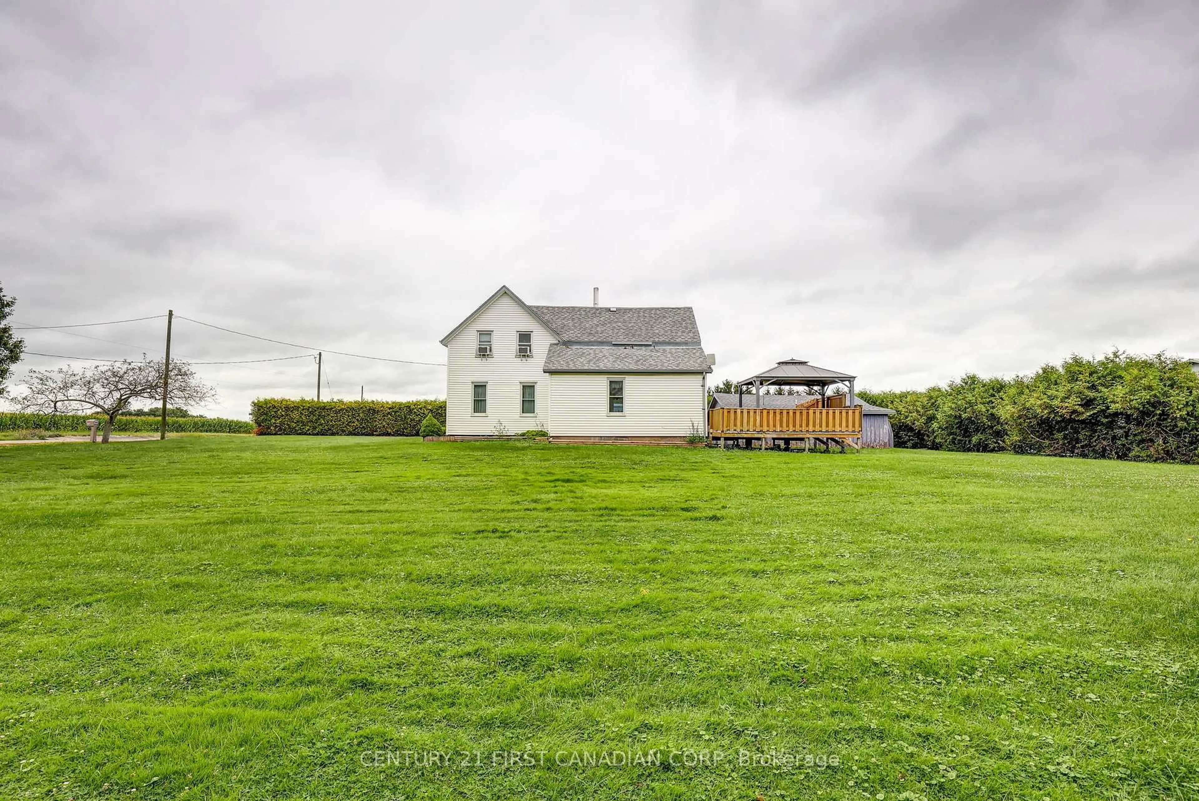 A pic from outside/outdoor area/front of a property/back of a property/a pic from drone, building for 45687 Fruit Ridge Line, Central Elgin Ontario N5P 3S9