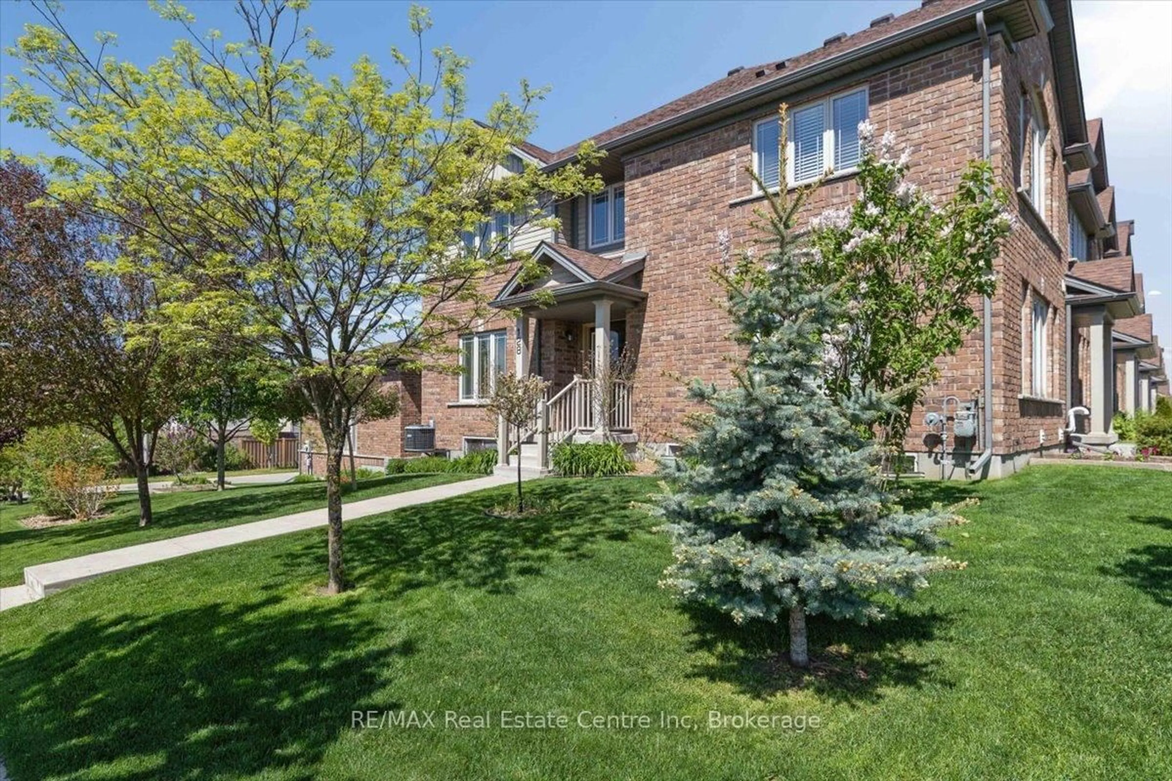 Home with brick exterior material, street for 128 Ingram Dr, Guelph Ontario N1E 0M6