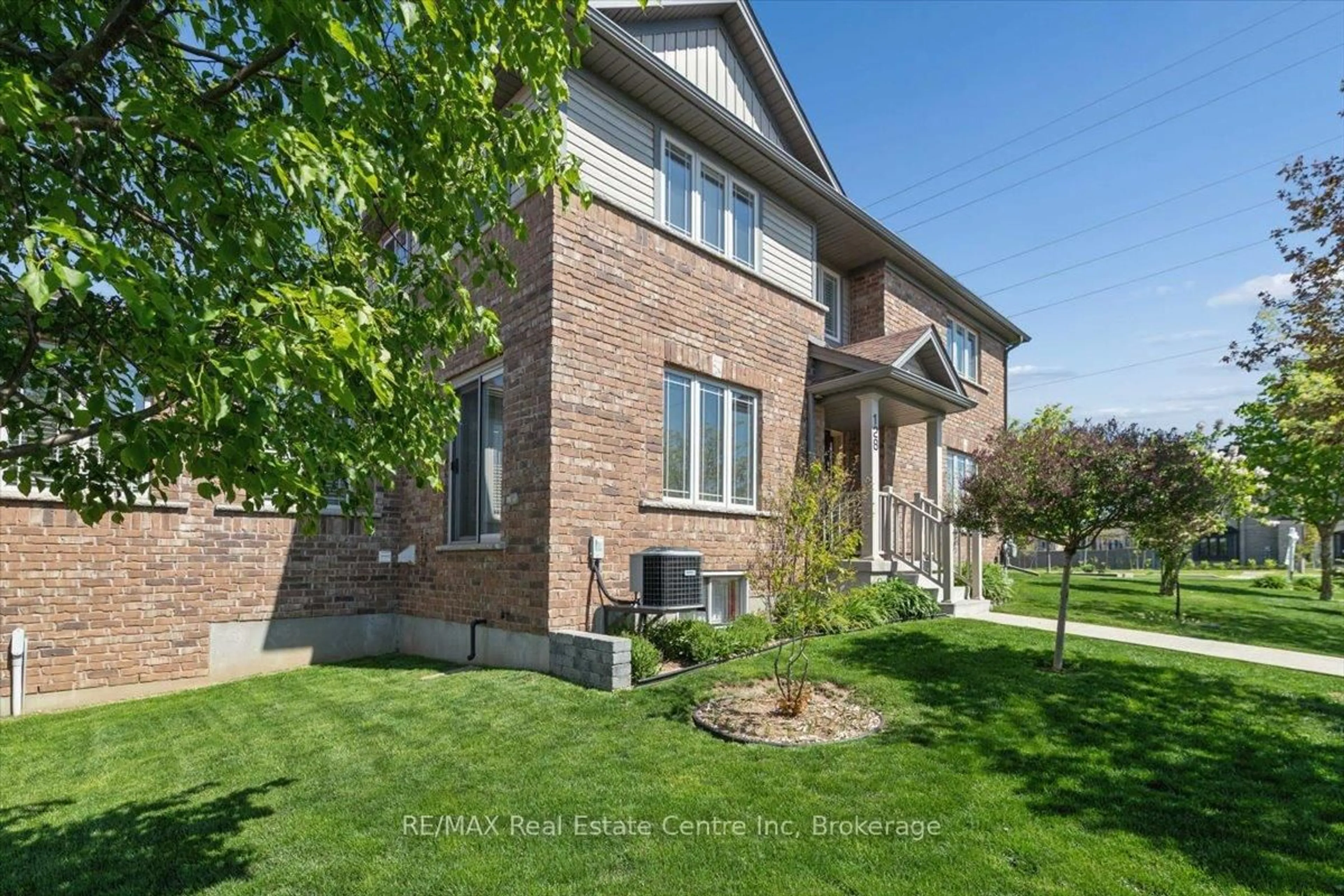 Home with brick exterior material, street for 128 Ingram Dr, Guelph Ontario N1E 0M6
