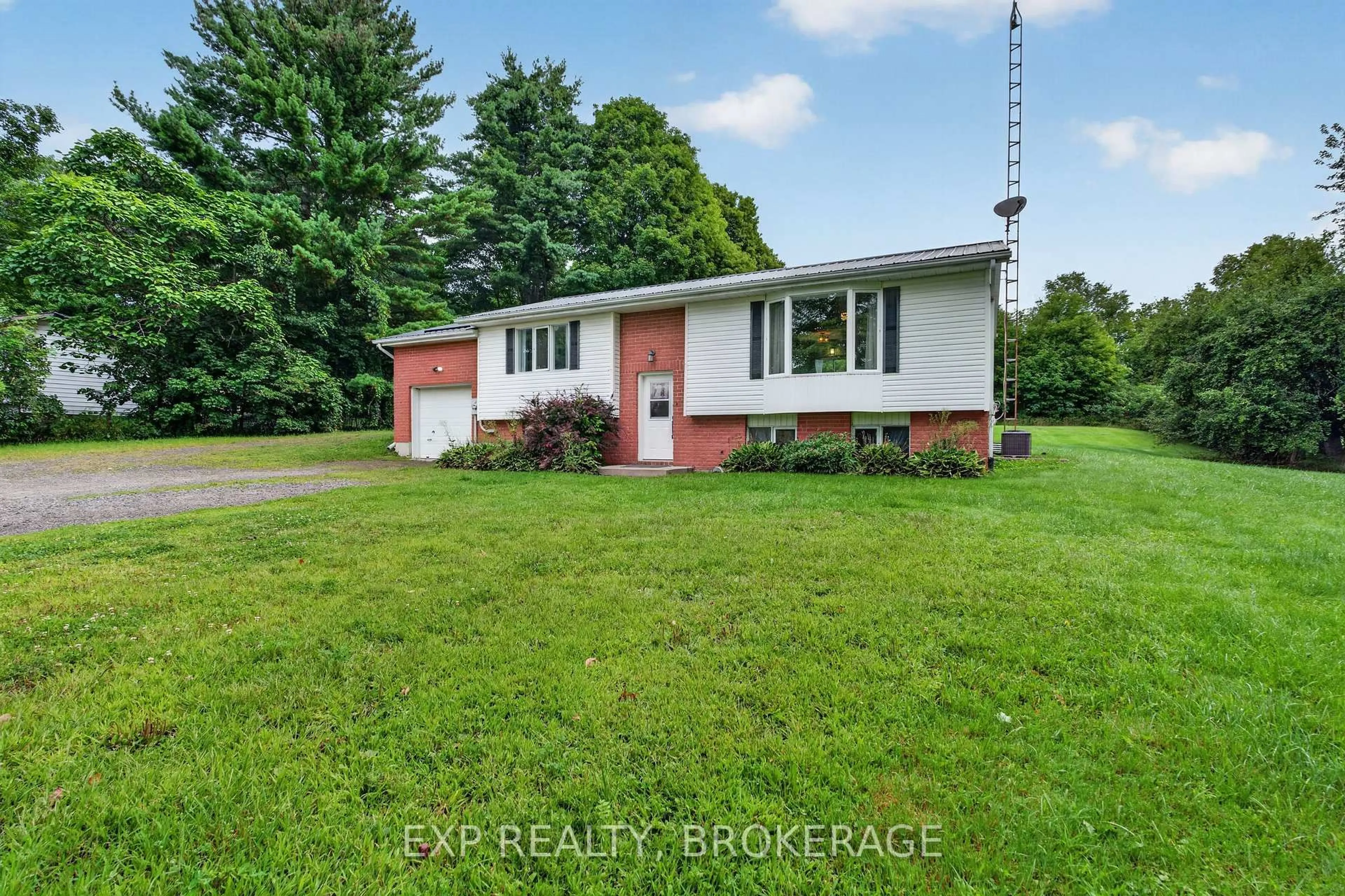A pic from outside/outdoor area/front of a property/back of a property/a pic from drone, street for 9009 PERTH Rd, Rideau Lakes Ontario K0G 1X0