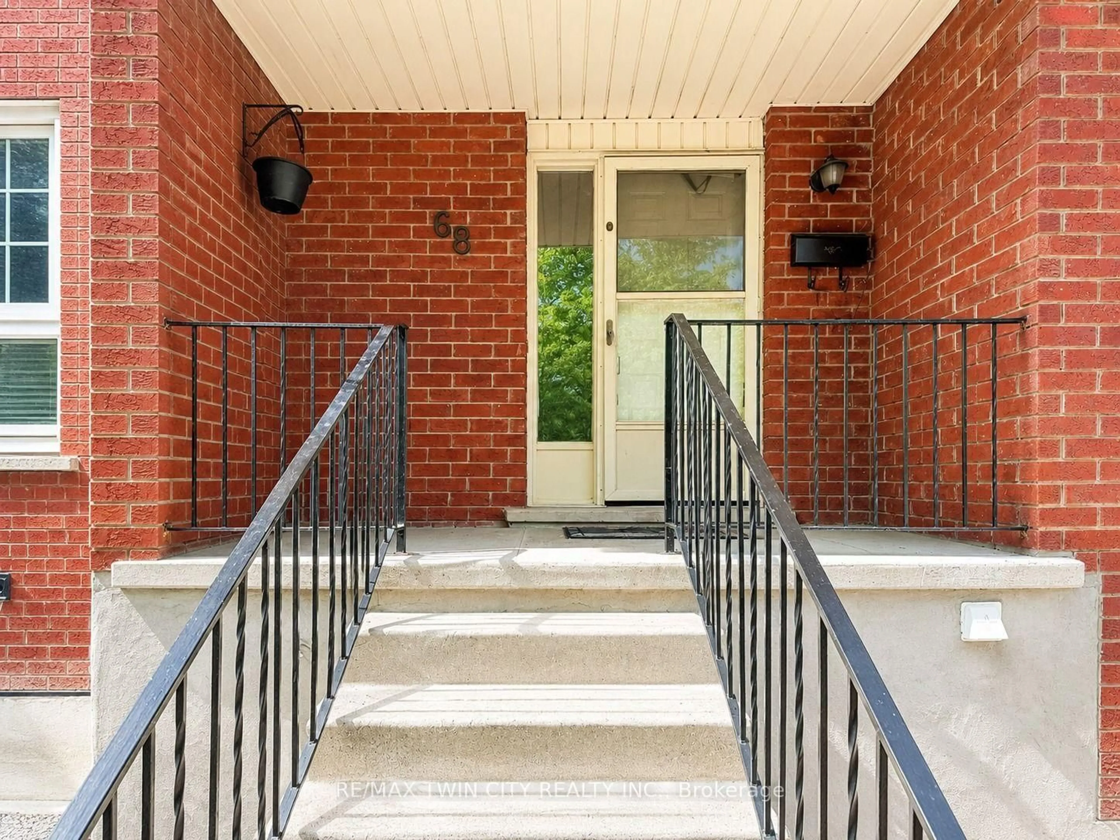 Home with brick exterior material, street for 68 Old Huron Crt, Kitchener Ontario N2R 1L7