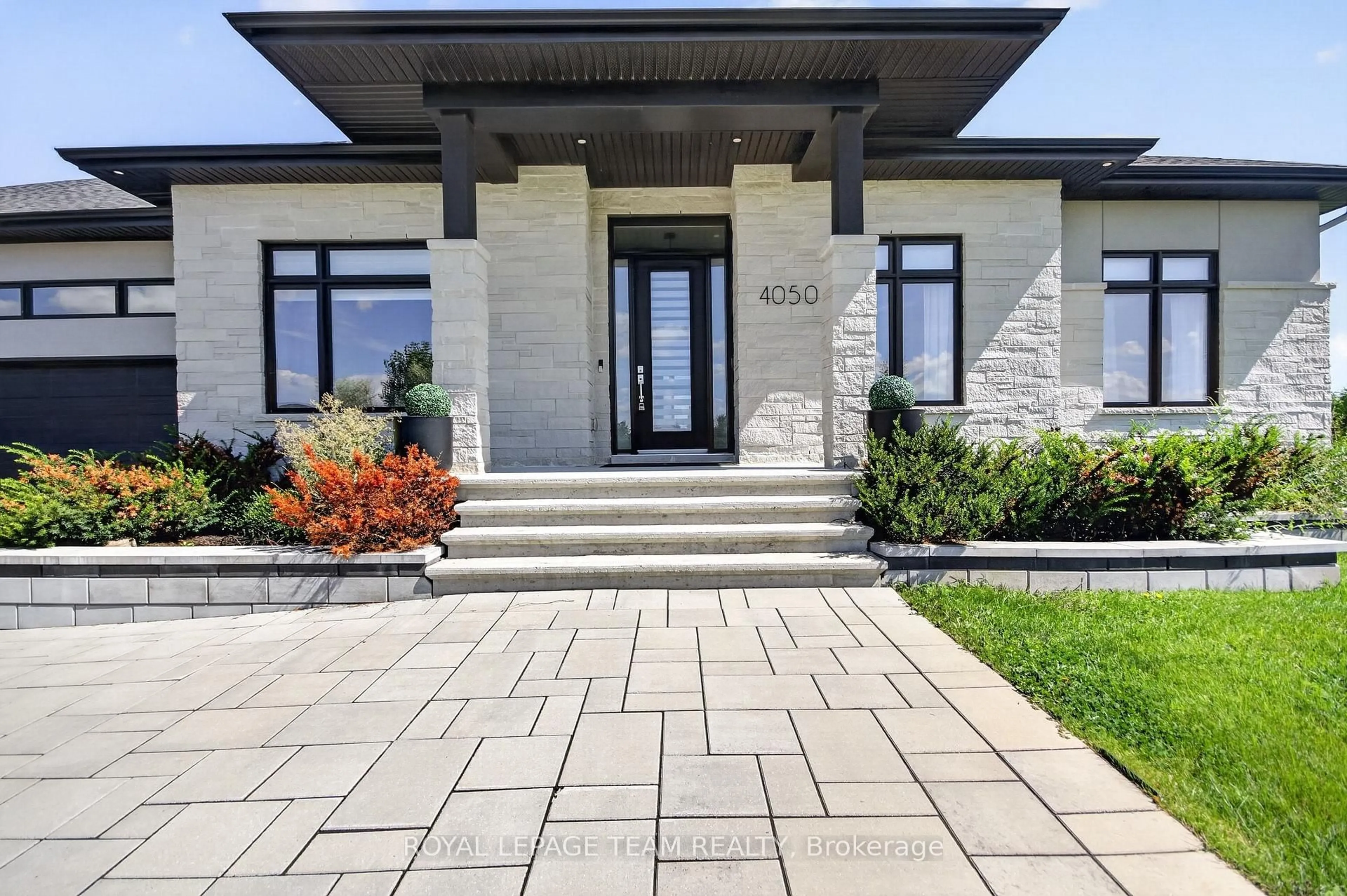 Home with brick exterior material, street for 4050 Perennial Way, Ottawa Ontario K4P 0E1